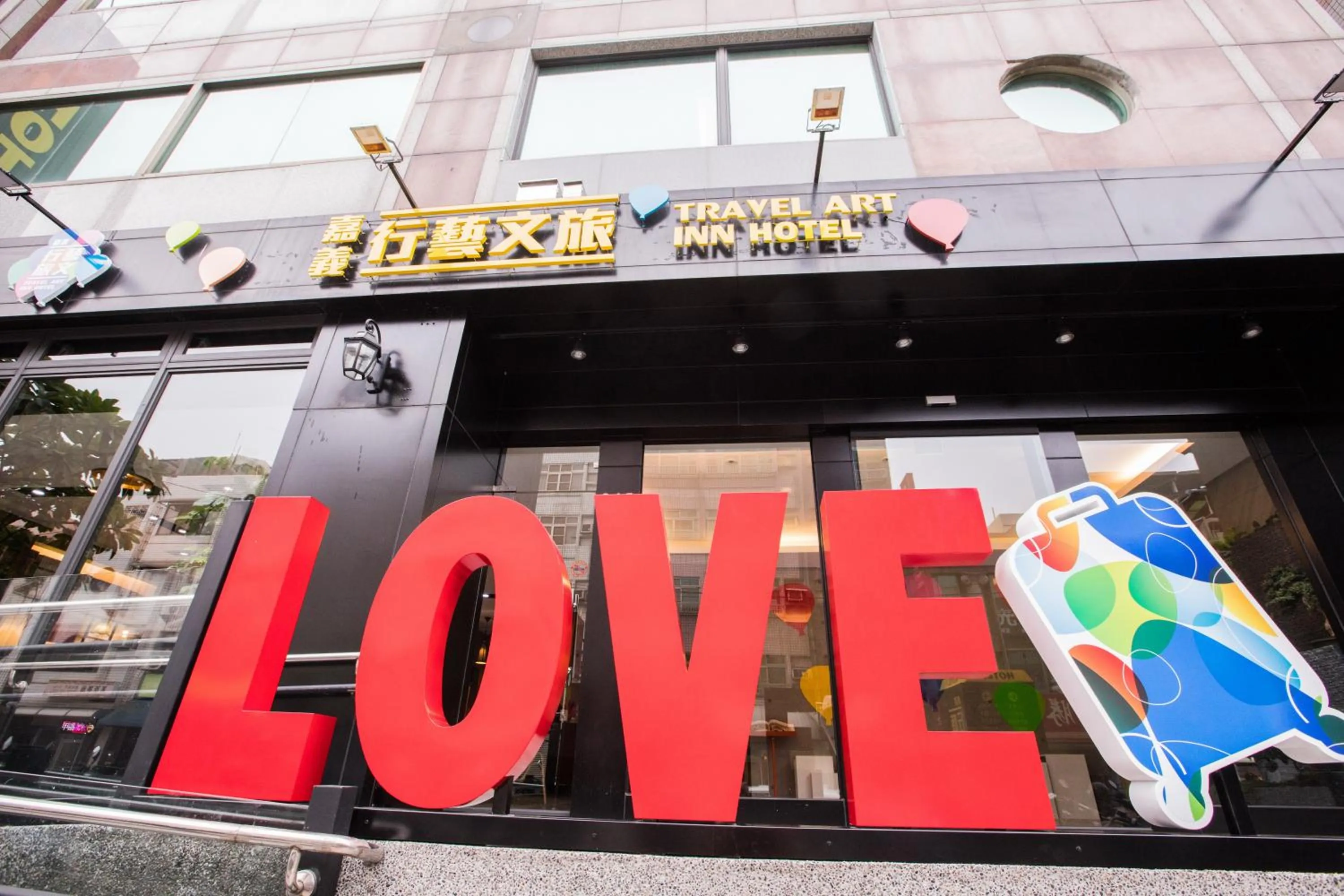 Property building in Travel Art Inn