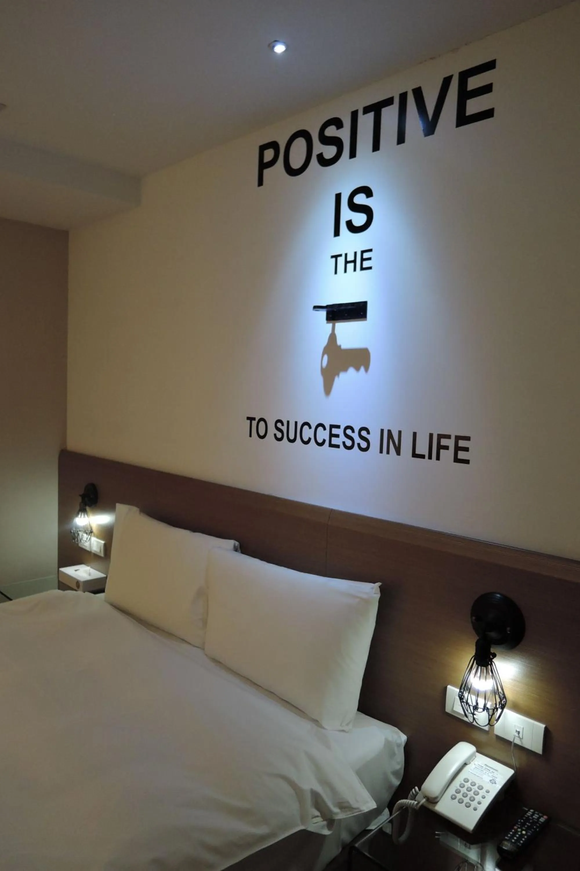 Decorative detail, Bed in Travel Art Inn