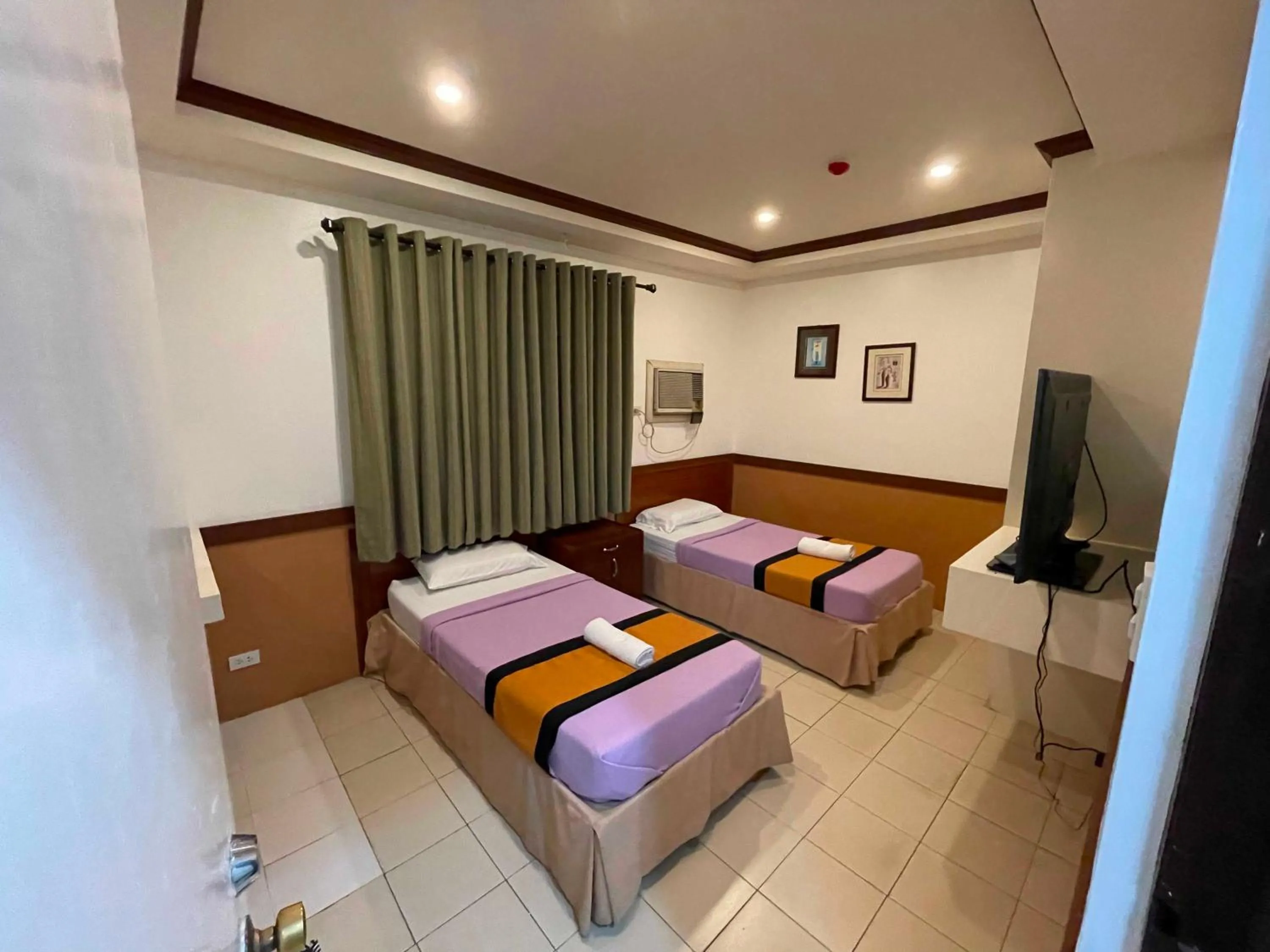 Bedroom in Palette Gems Hotel and Conference Center