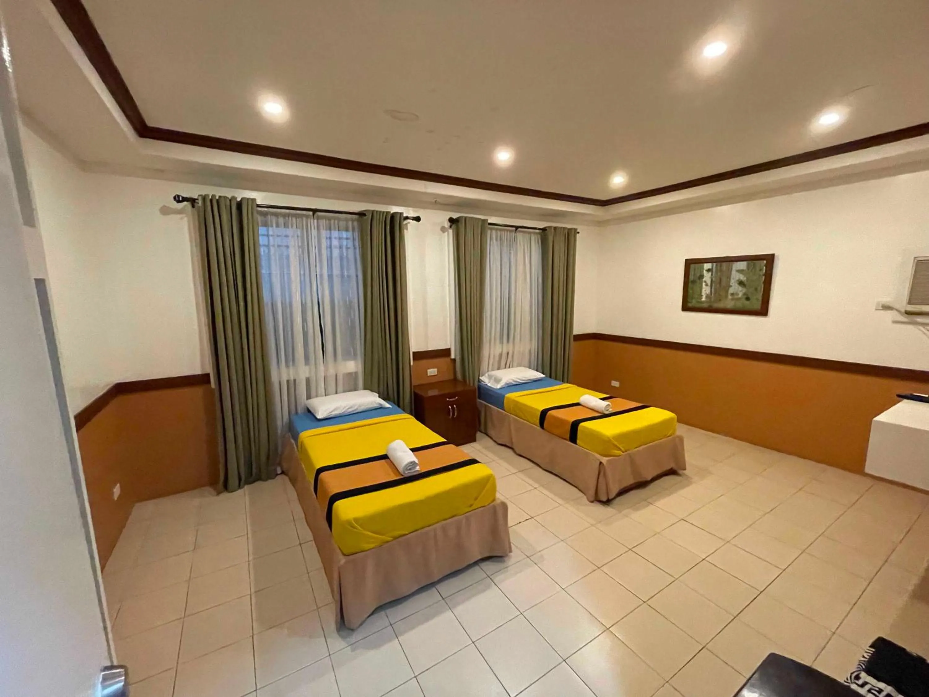 Bedroom in Palette Gems Hotel and Conference Center