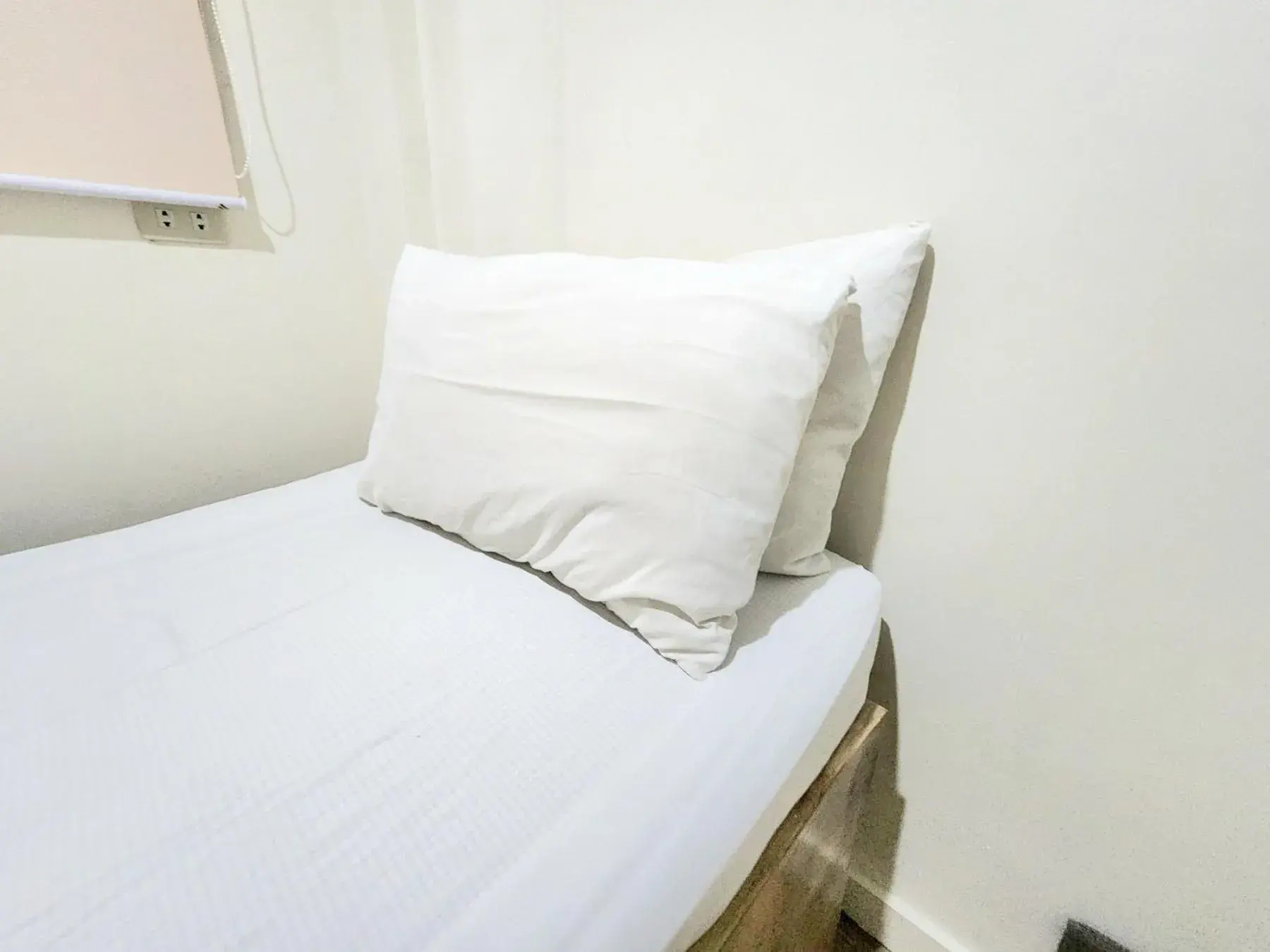 Bed in Stone House Hotel Manila Bed in Stone House Hotel Manila