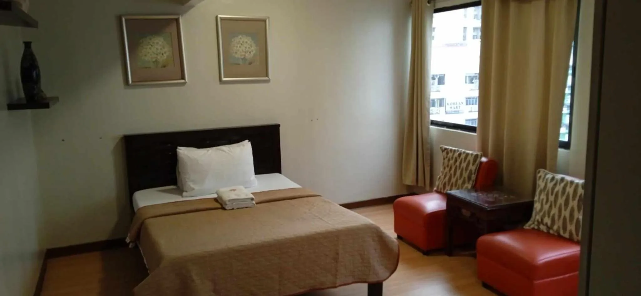 Bed in Stone House Hotel Manila