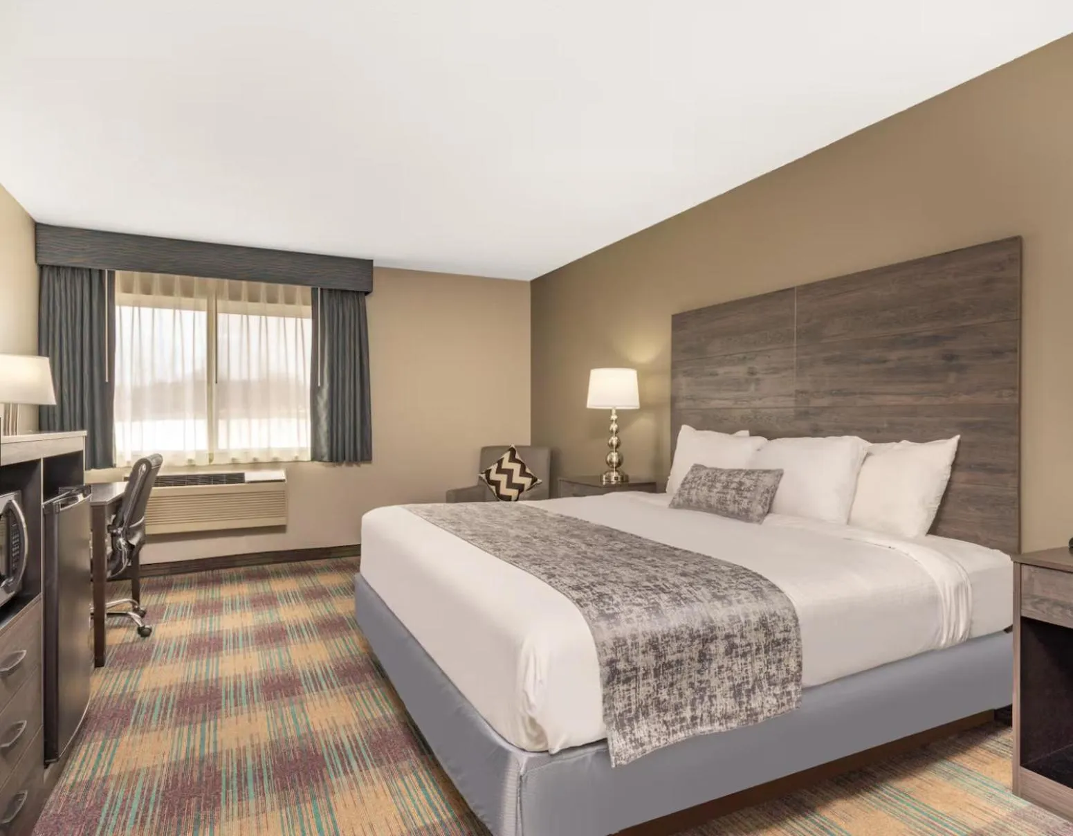 Bed in Baymont by Wyndham Baldwin