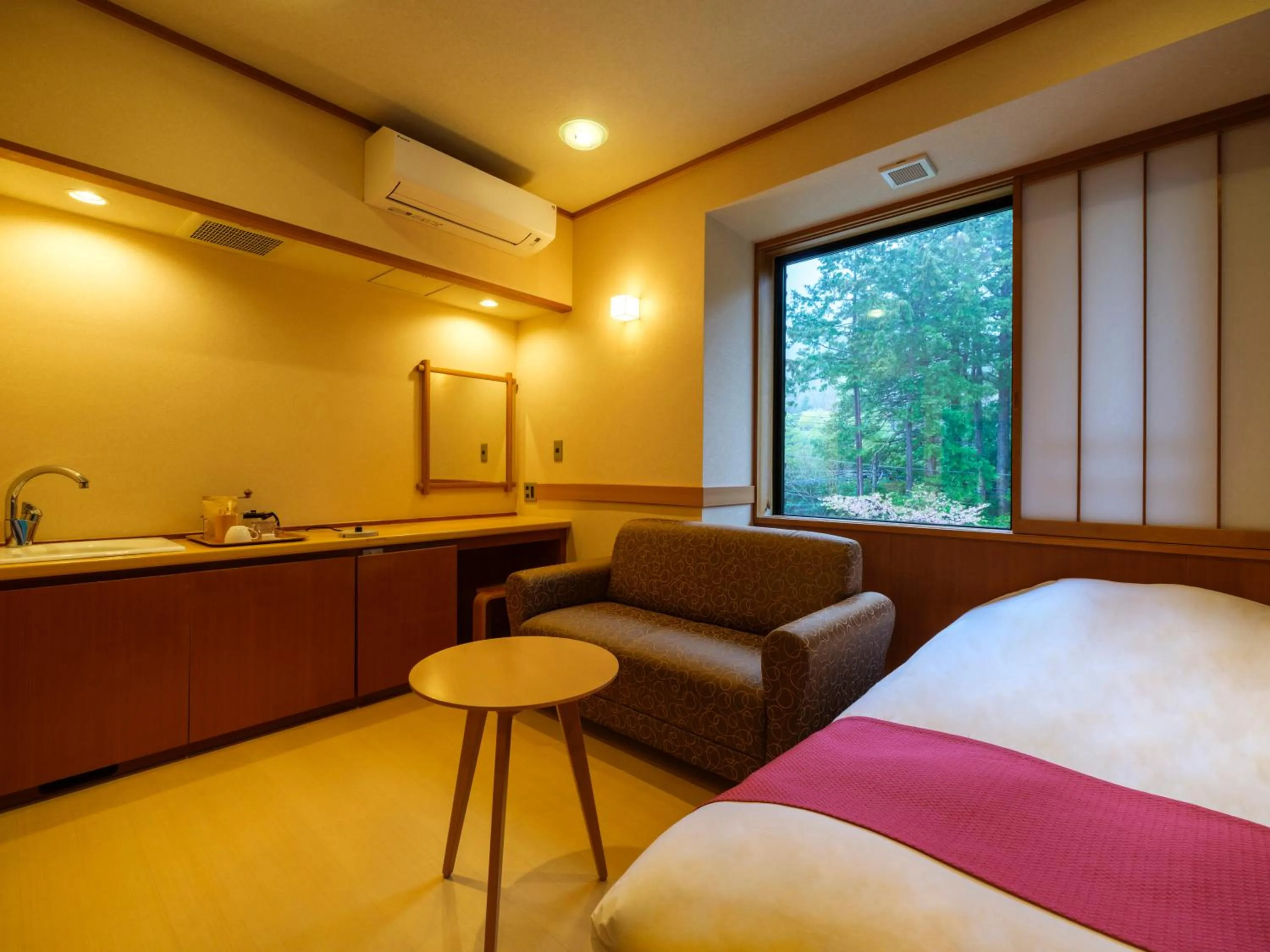 Photo of the whole room, Bed in Mizunoto Reopening on April 1, 2025