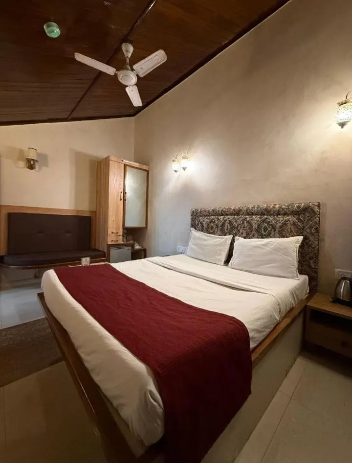 Bed in Hotel Beach Garden