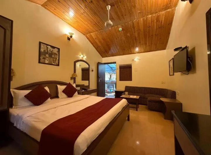 Bed in Hotel Beach Garden