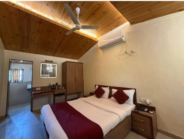 Bed in Hotel Beach Garden