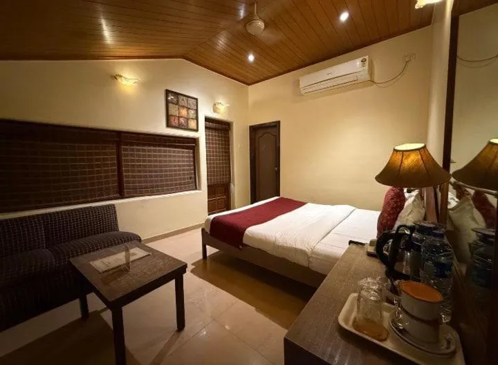 Bed in Hotel Beach Garden