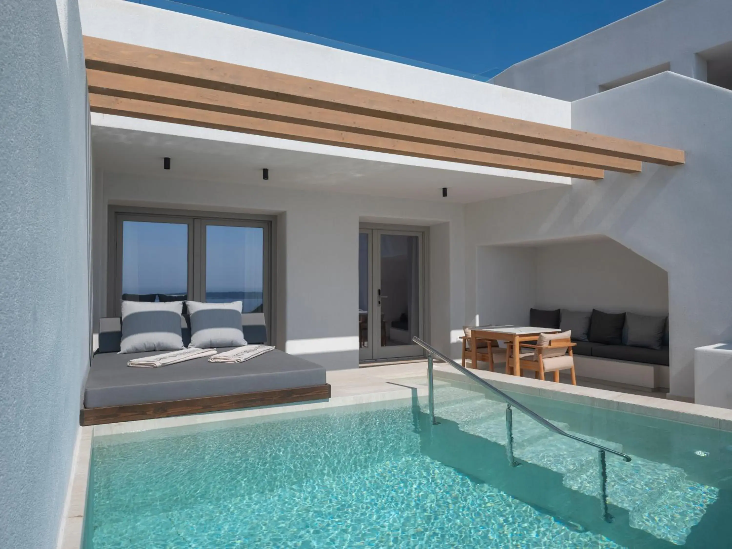Pool view in Santo Pure Oia Suites & Villas Pool view in Santo Pure Oia Suites & Villas