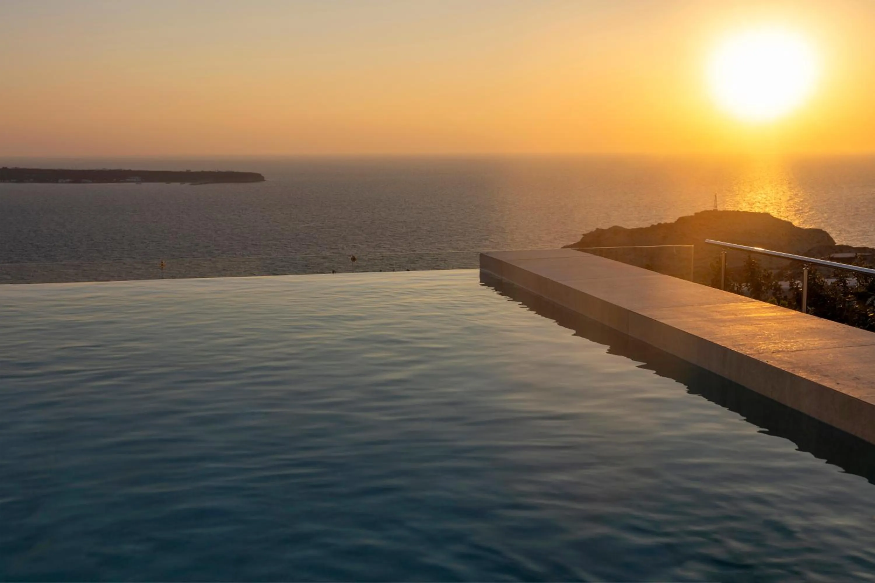 Sunset in Santo Pure Oia Suites & Villas