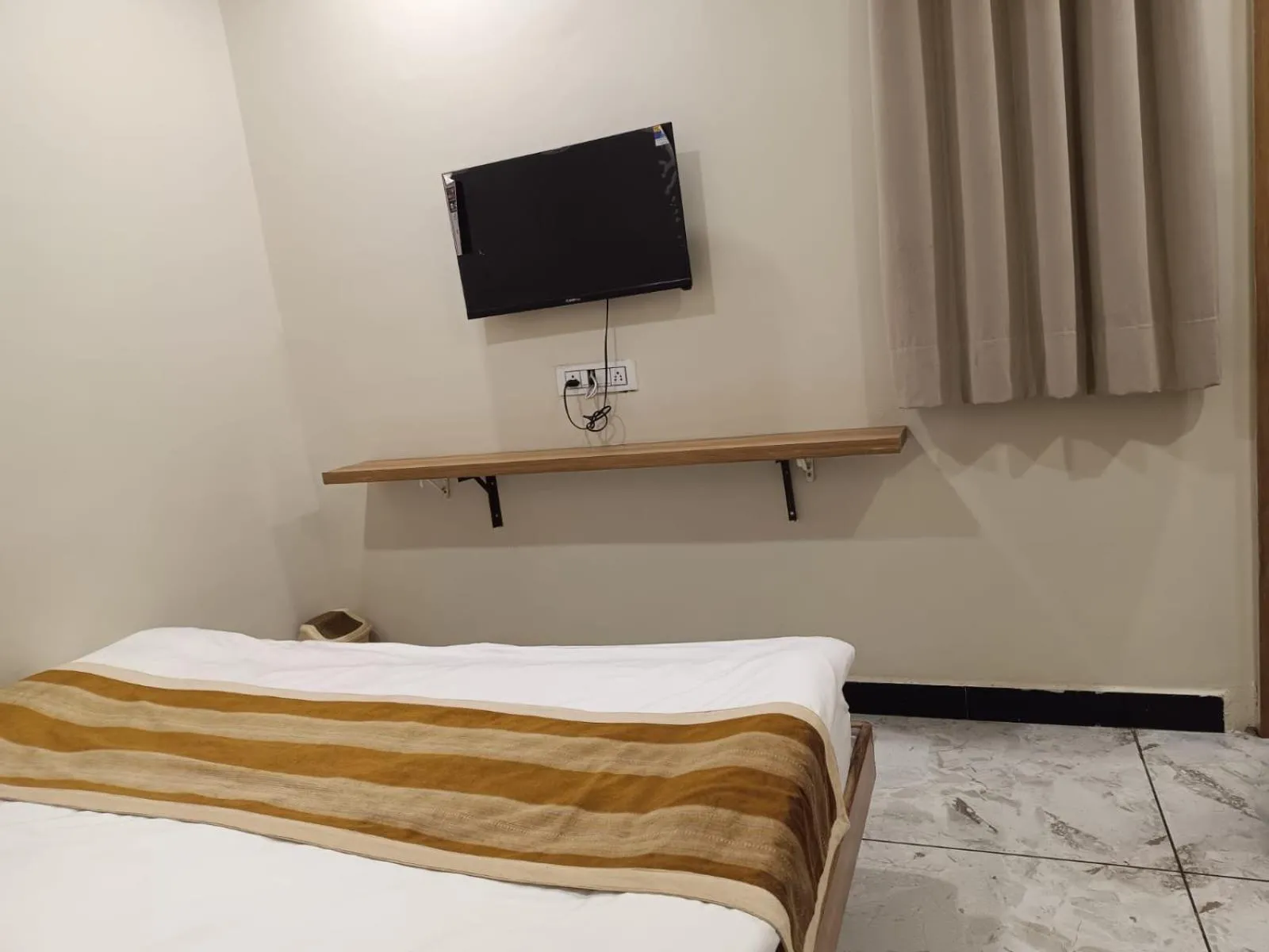 Bed in ShyamRaj Hotel