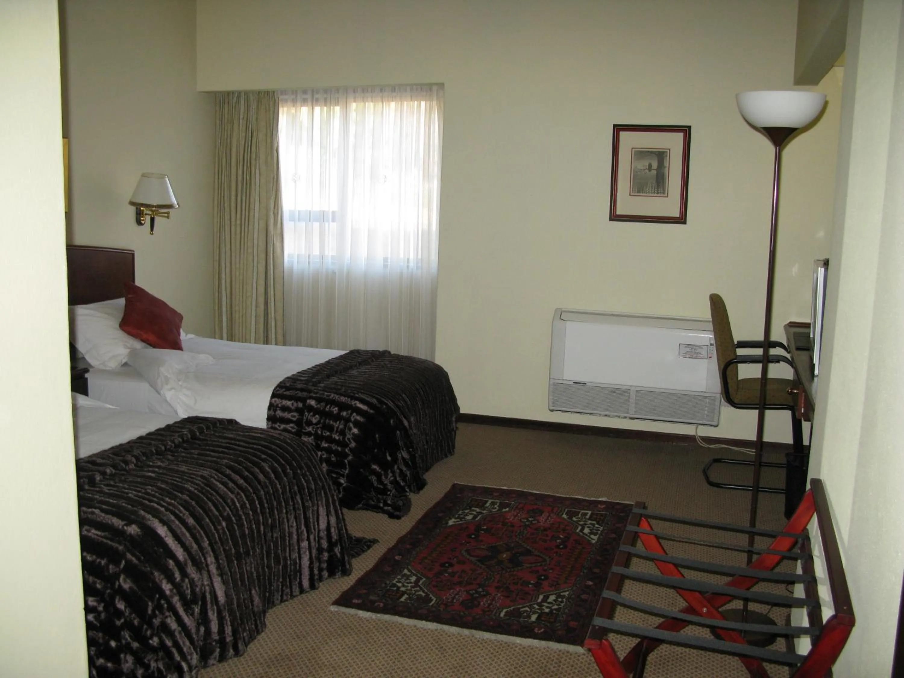 Photo of the whole room, Bed in Benvenuto Hotel & Conference Centre