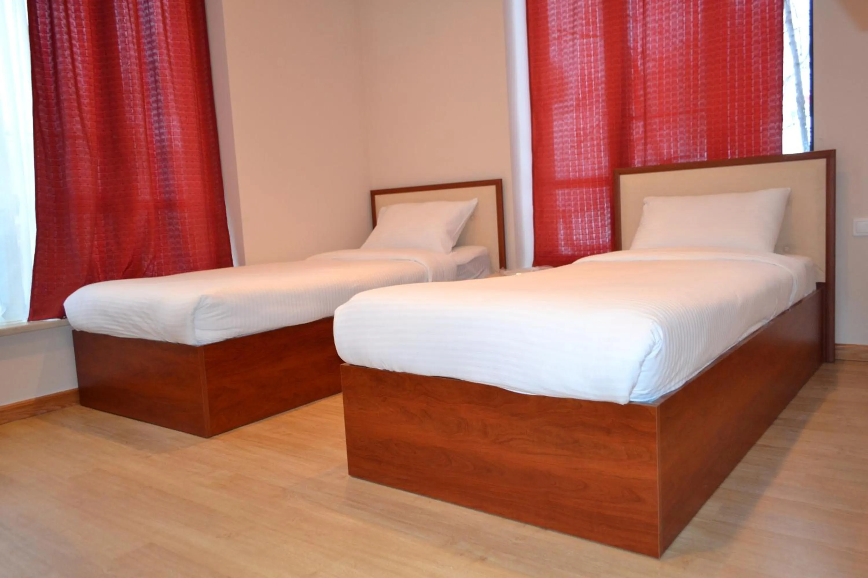 Bedroom in Villadzor Apart Hotel