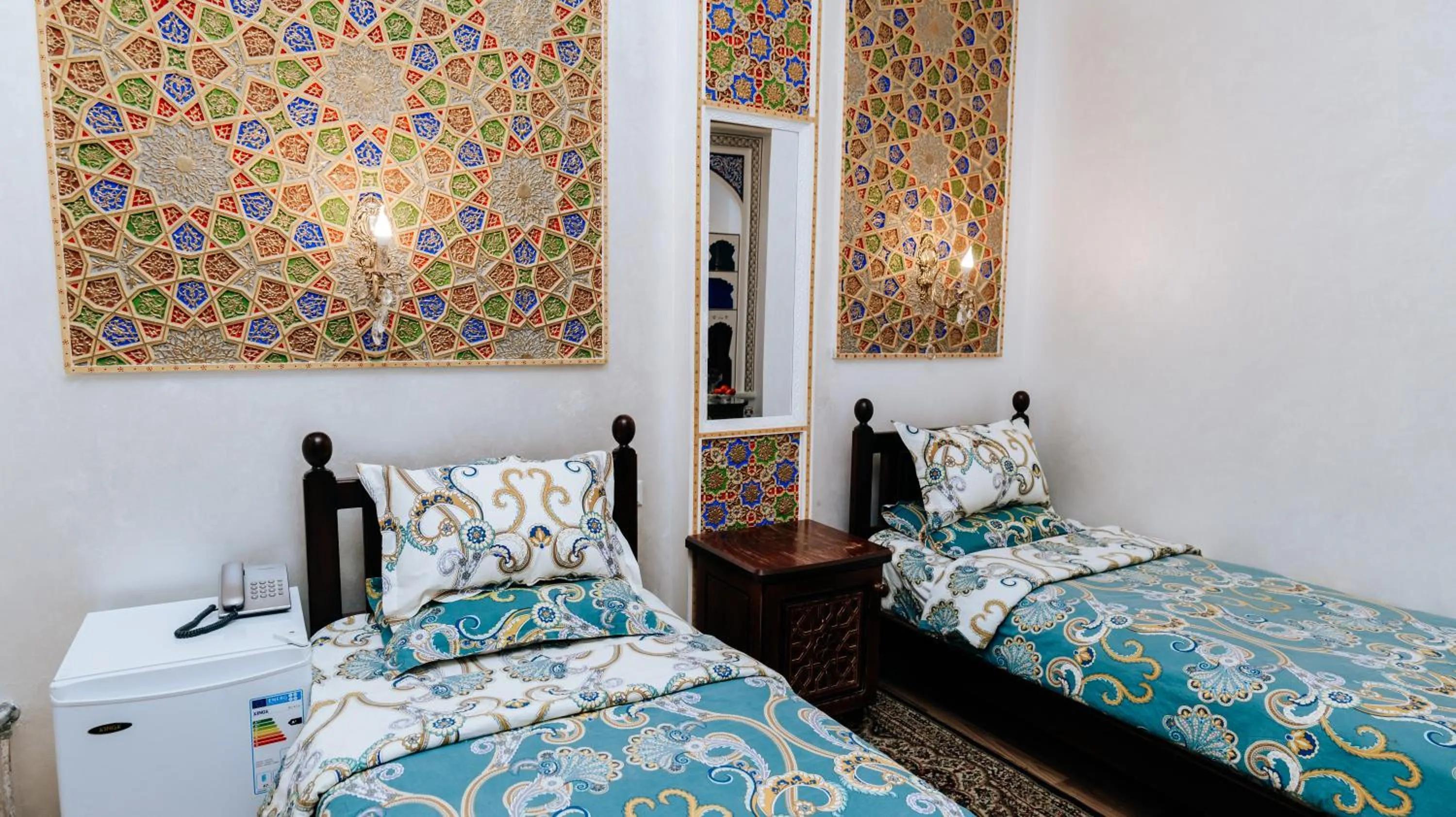 Bed in Golden Bukhara Boutique Hotel National