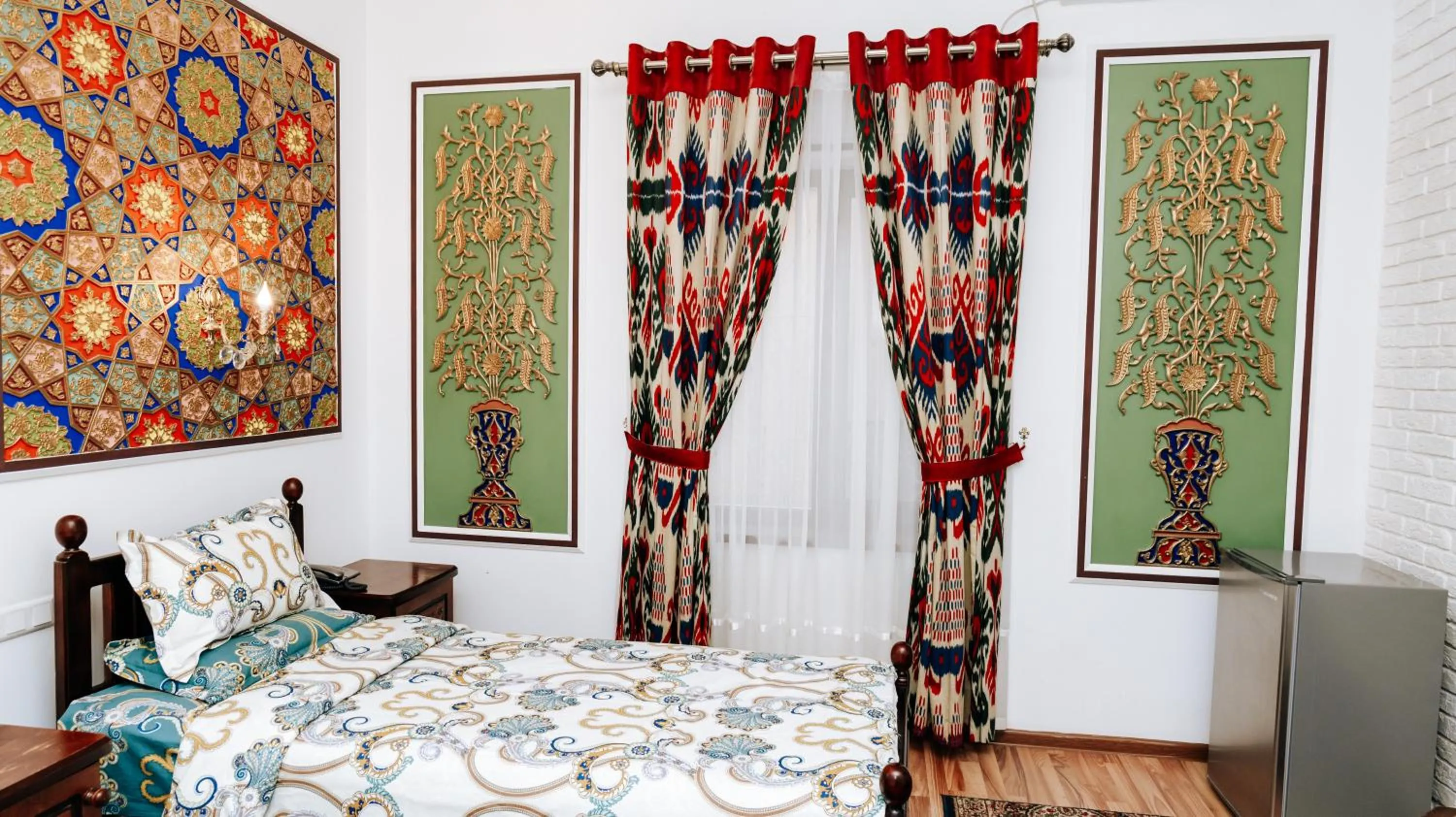 Bed in Golden Bukhara Boutique Hotel National
