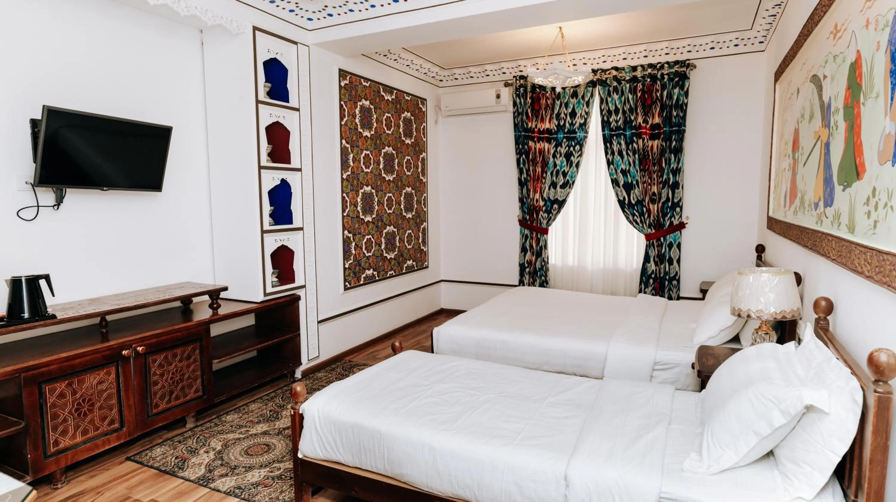 Bed in Golden Bukhara Boutique Hotel National