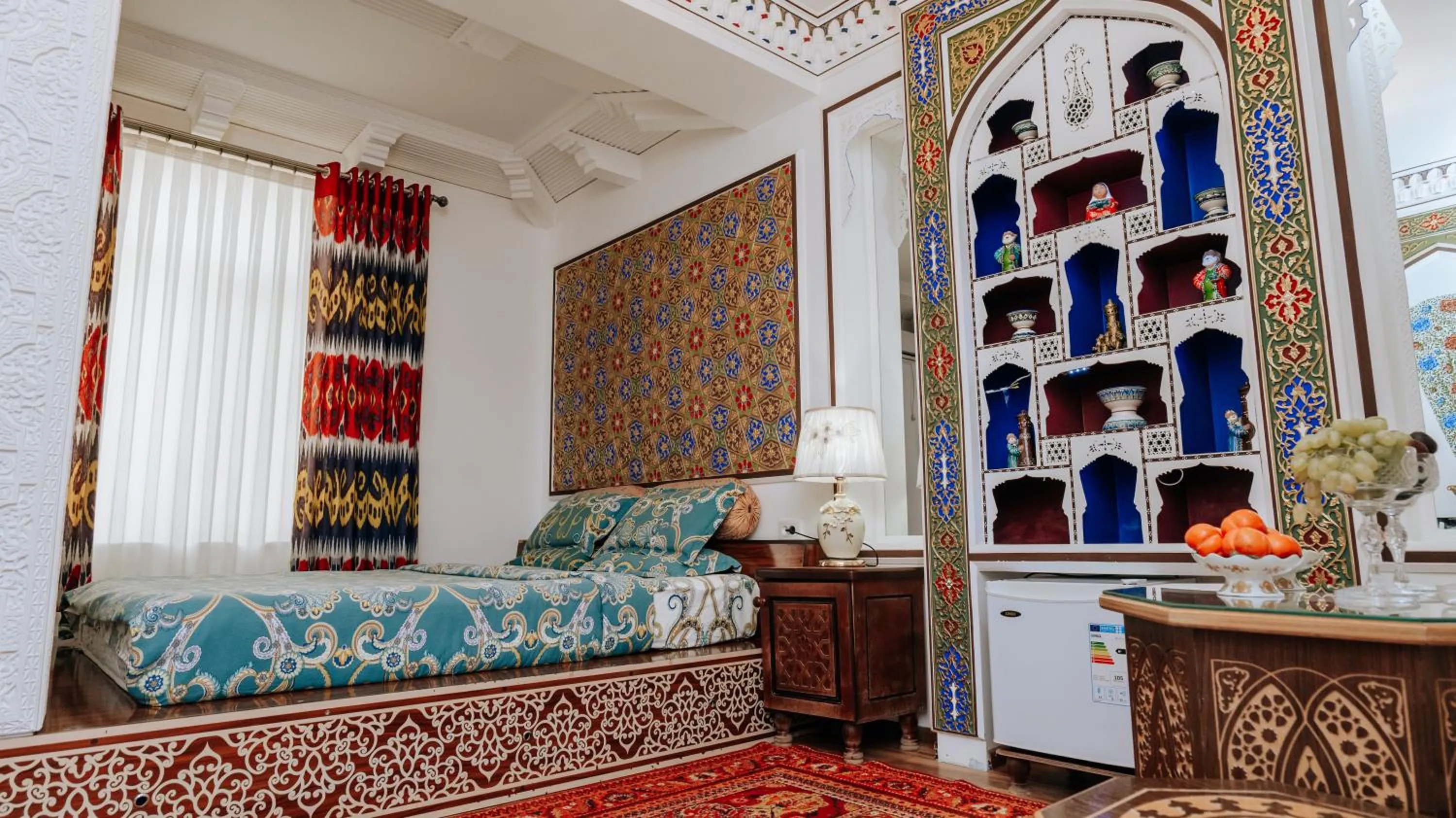 Bed in Golden Bukhara Boutique Hotel National