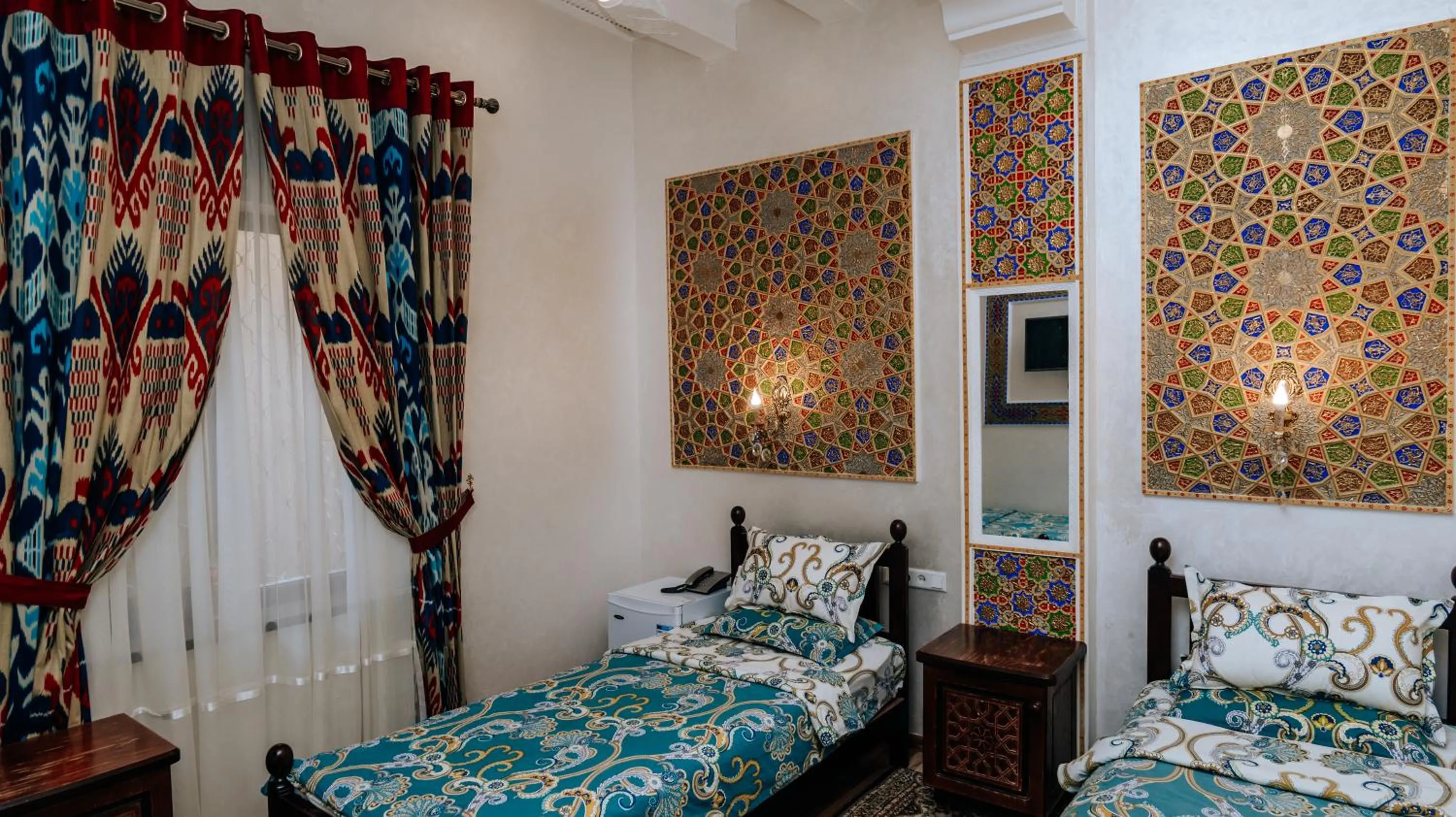 Bed in Golden Bukhara Boutique Hotel National