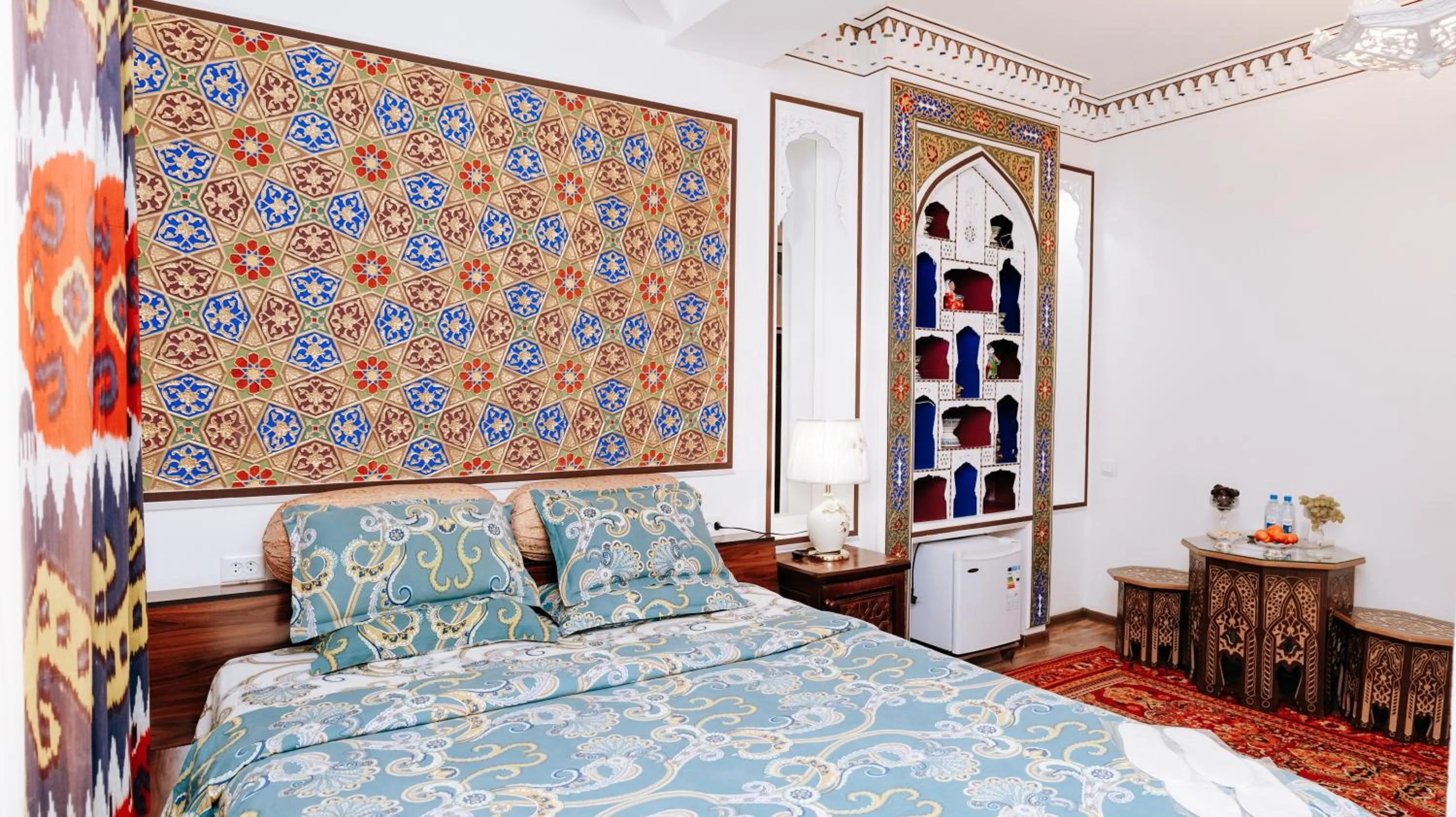 Bed in Golden Bukhara Boutique Hotel National