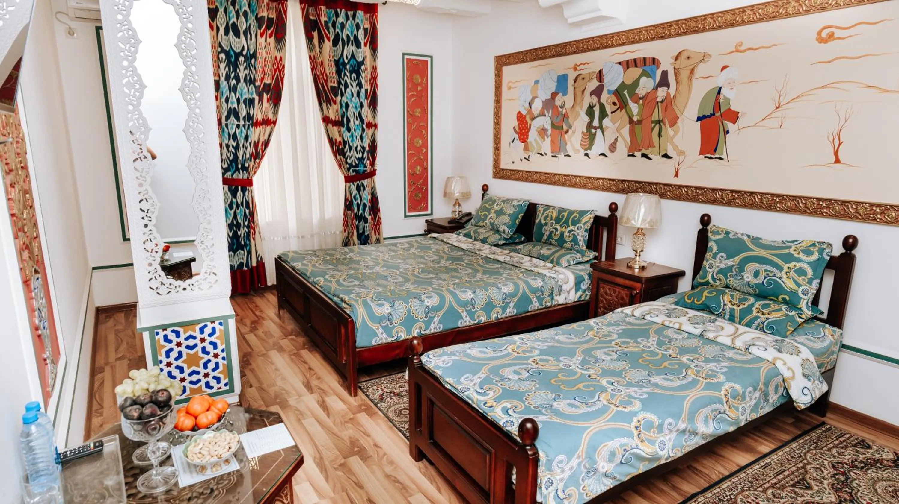 Bed in Golden Bukhara Boutique Hotel National
