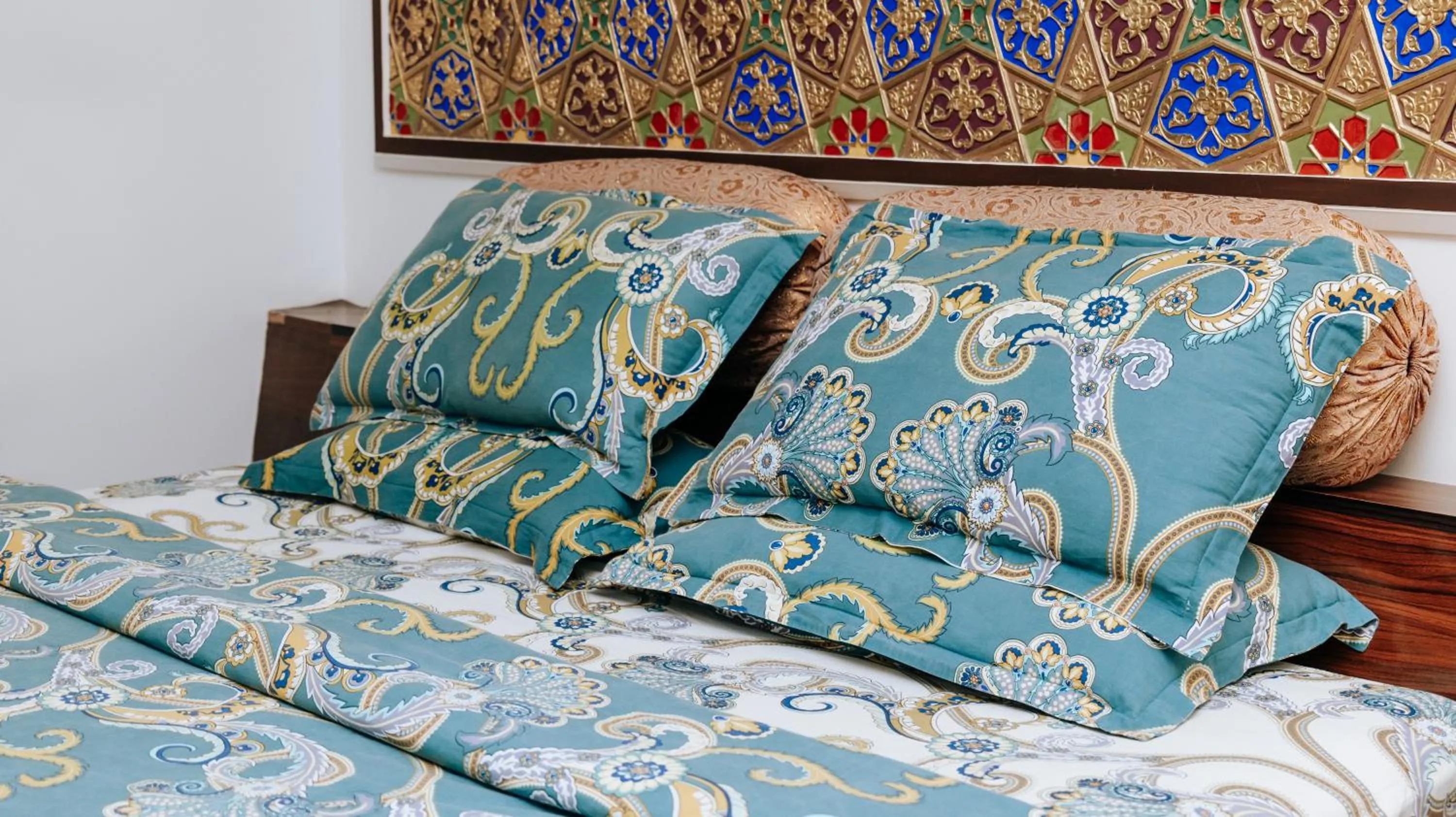 Bed in Golden Bukhara Boutique Hotel National