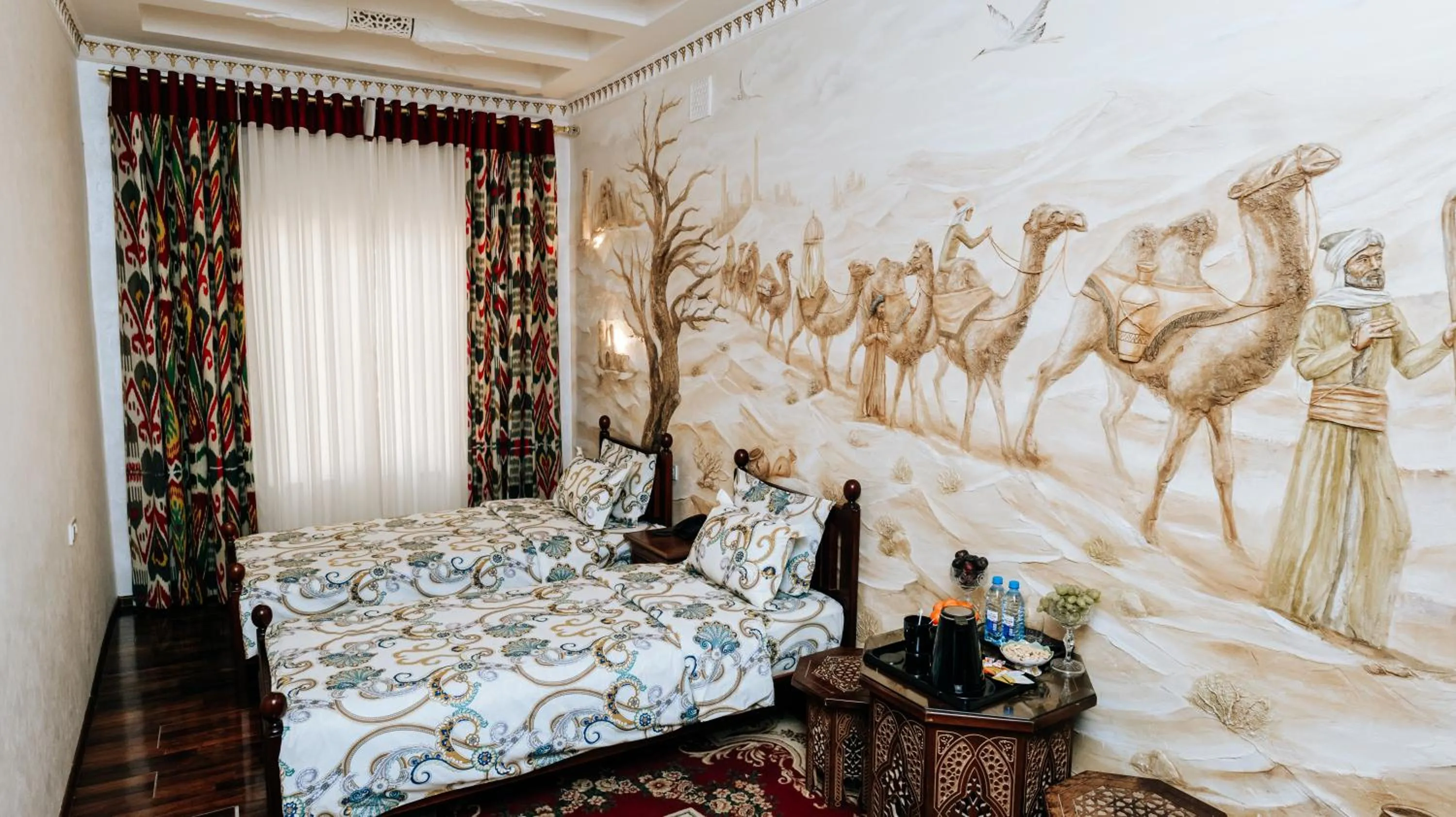 Bed in Golden Bukhara Boutique Hotel National