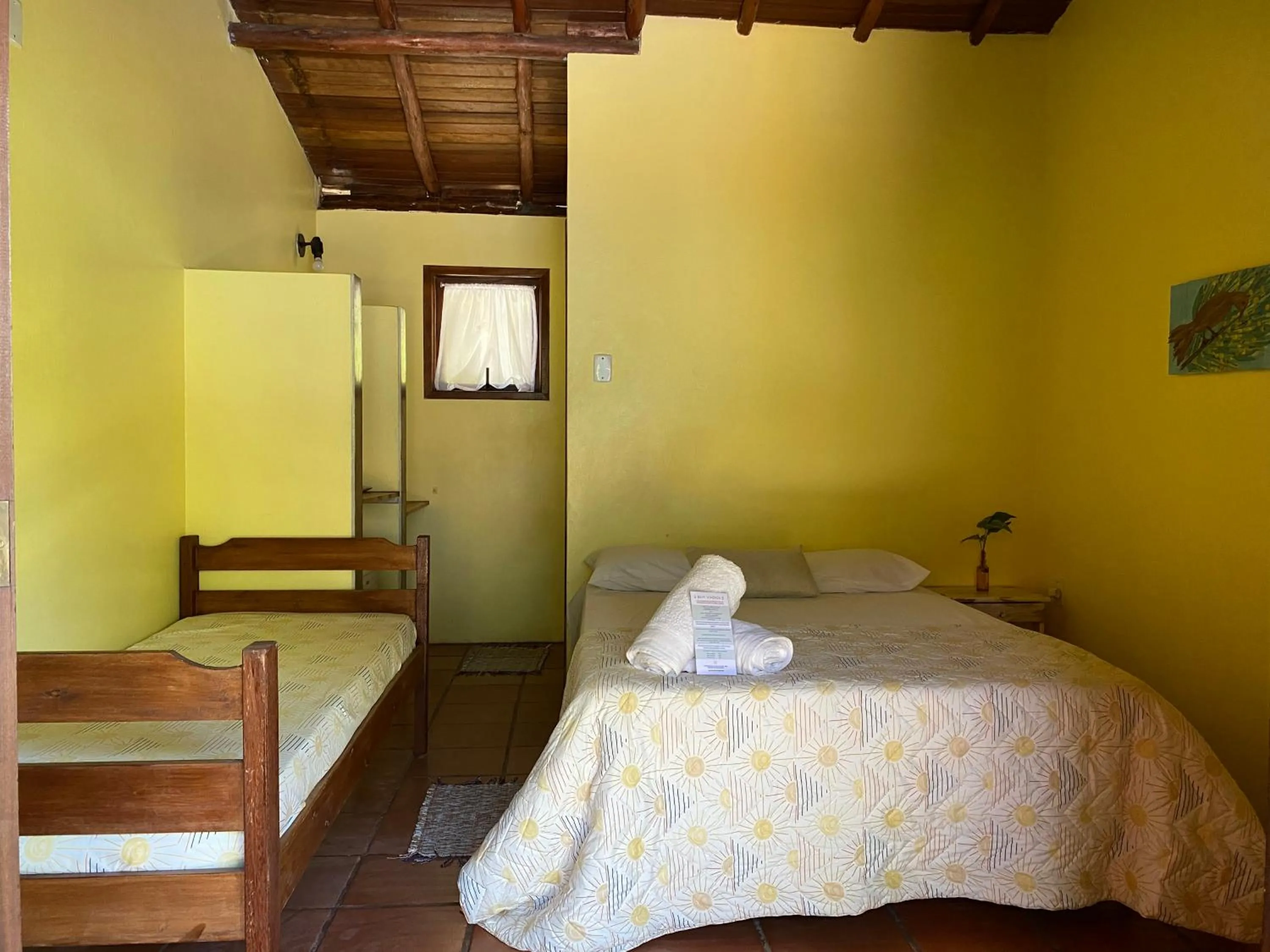 Photo of the whole room, Bed in Pousada Paradise Ferrugem