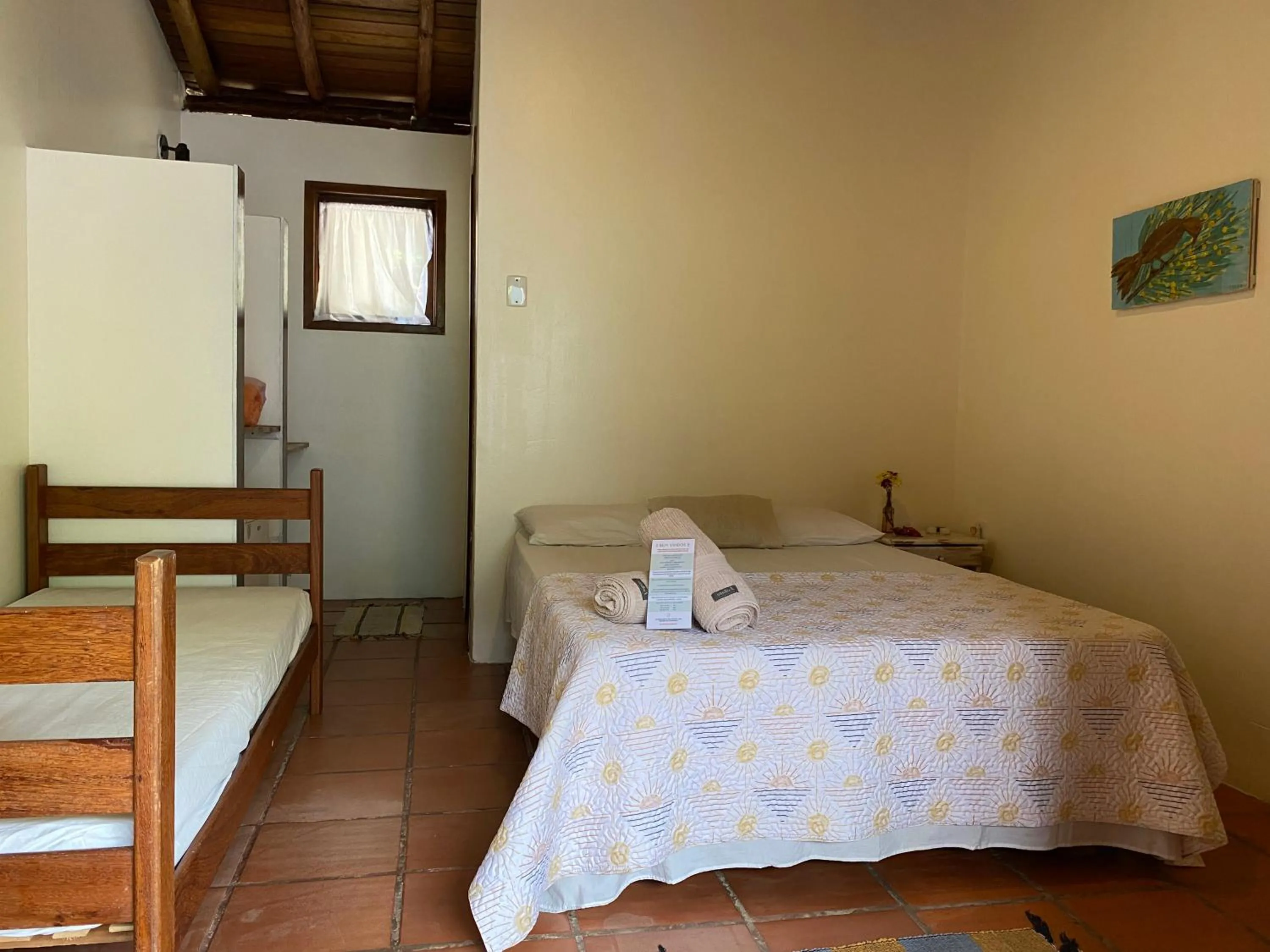 Photo of the whole room, Bed in Pousada Paradise Ferrugem
