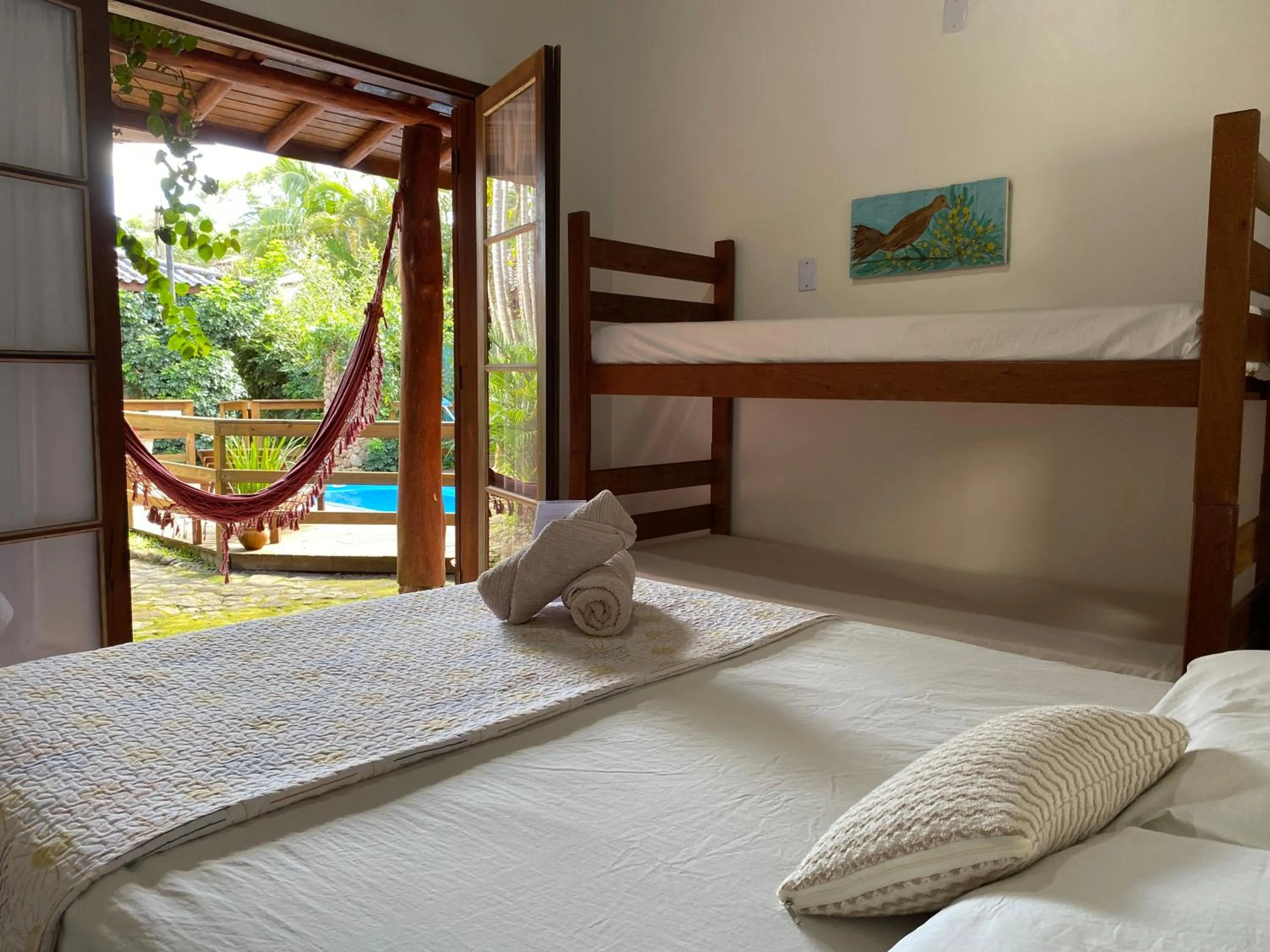 Bed in Pousada Paradise Ferrugem