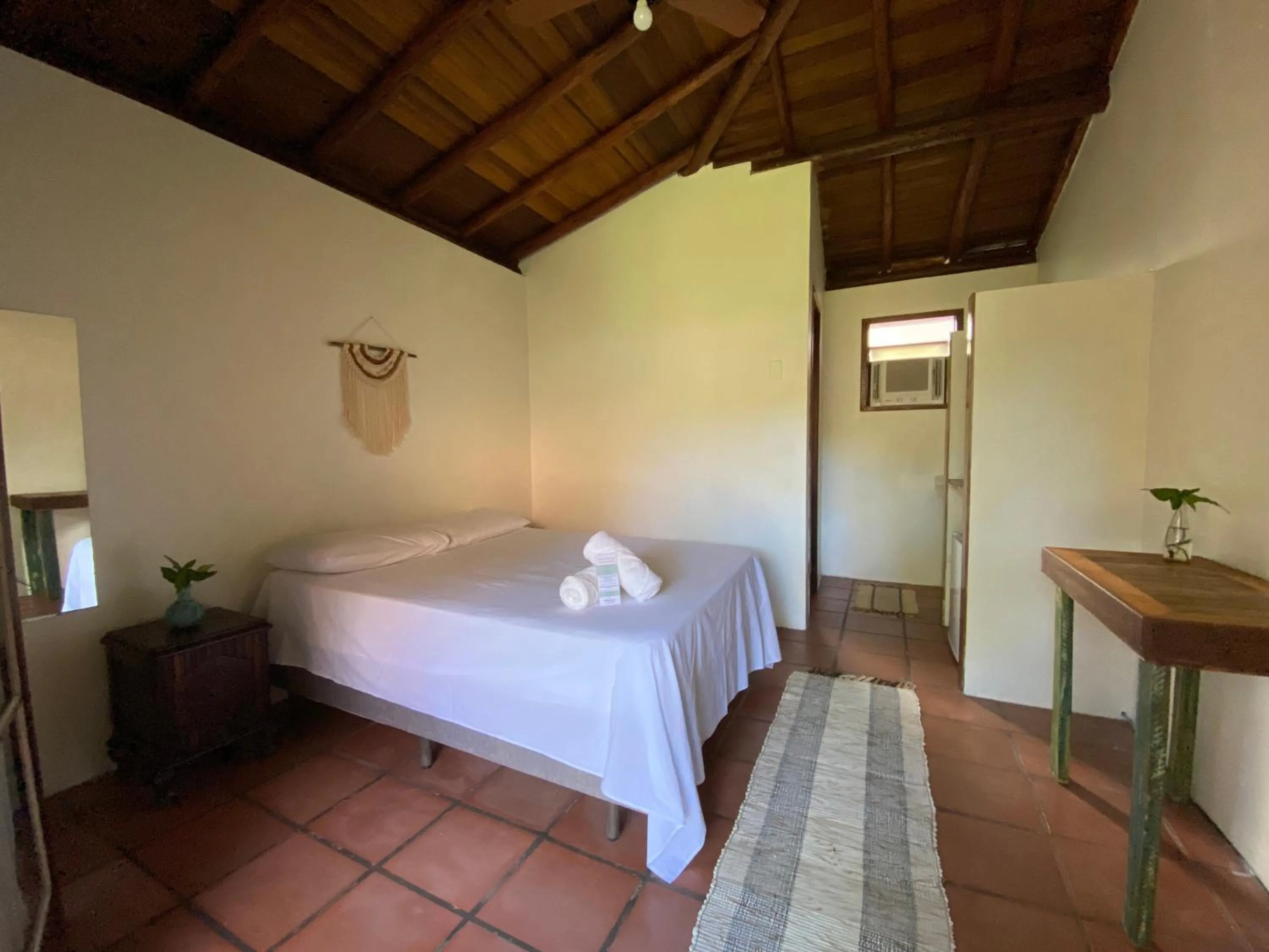 Photo of the whole room, Bed in Pousada Paradise Ferrugem