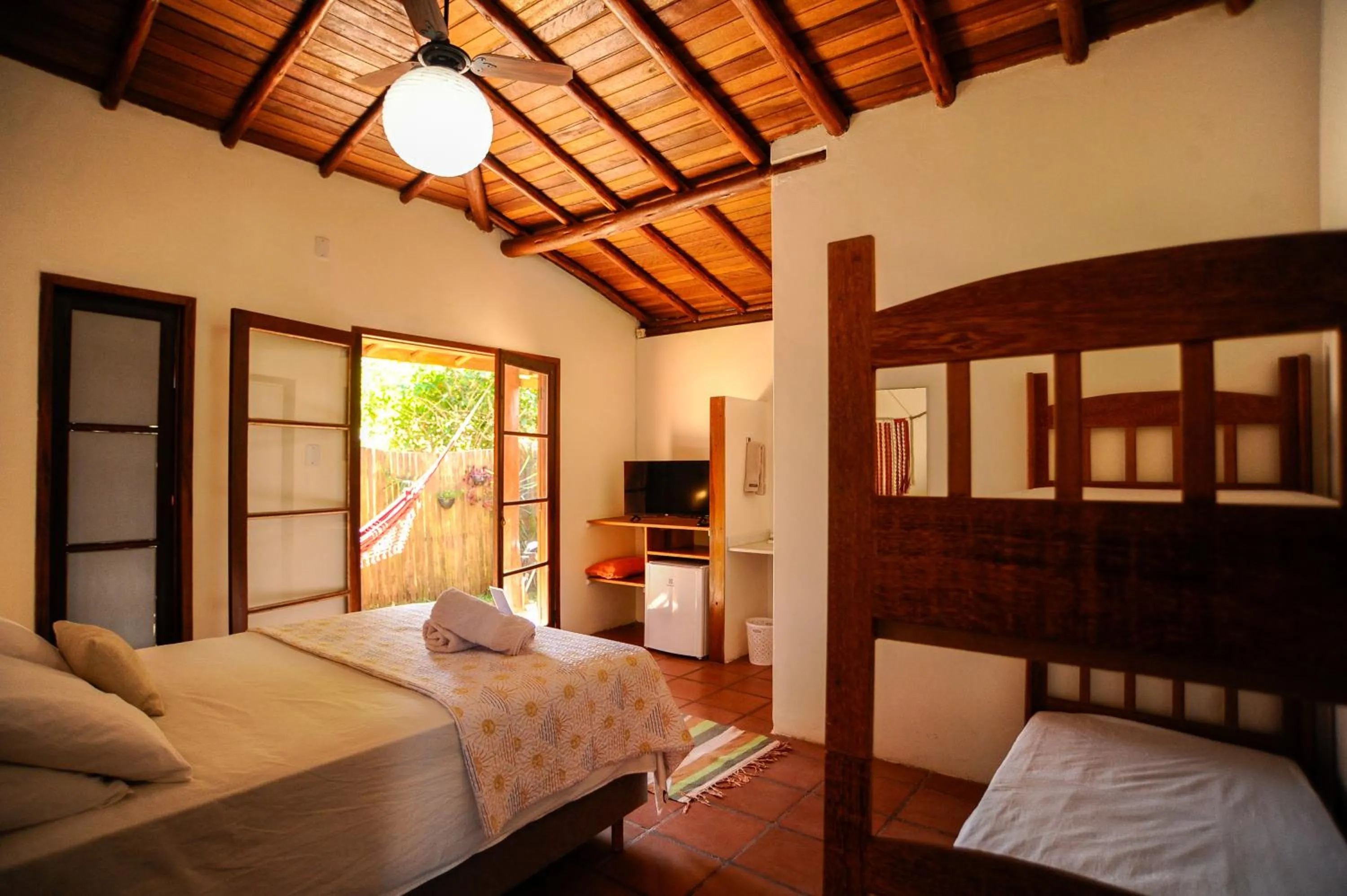 Bed in Pousada Paradise Ferrugem