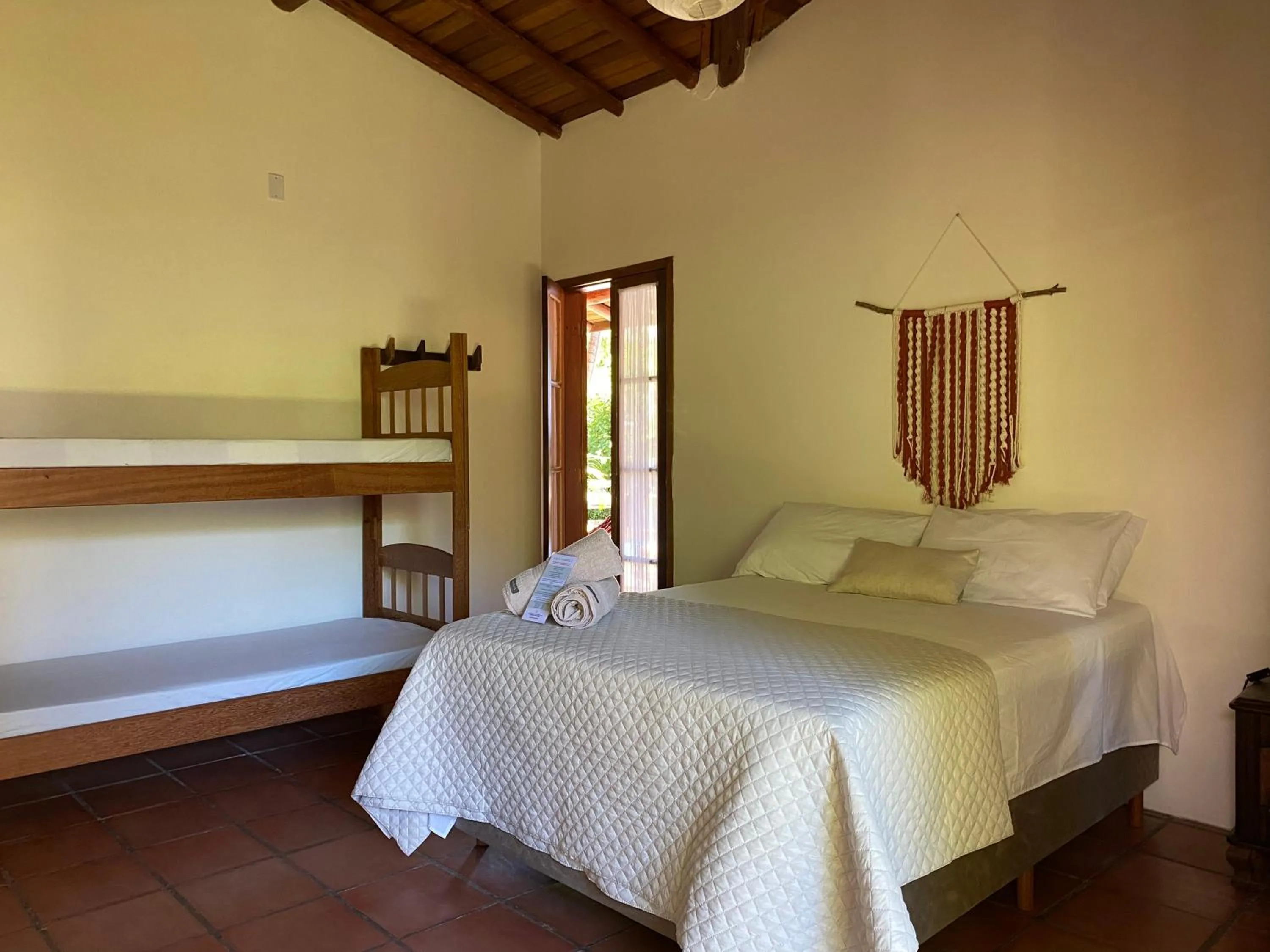 Bed in Pousada Paradise Ferrugem