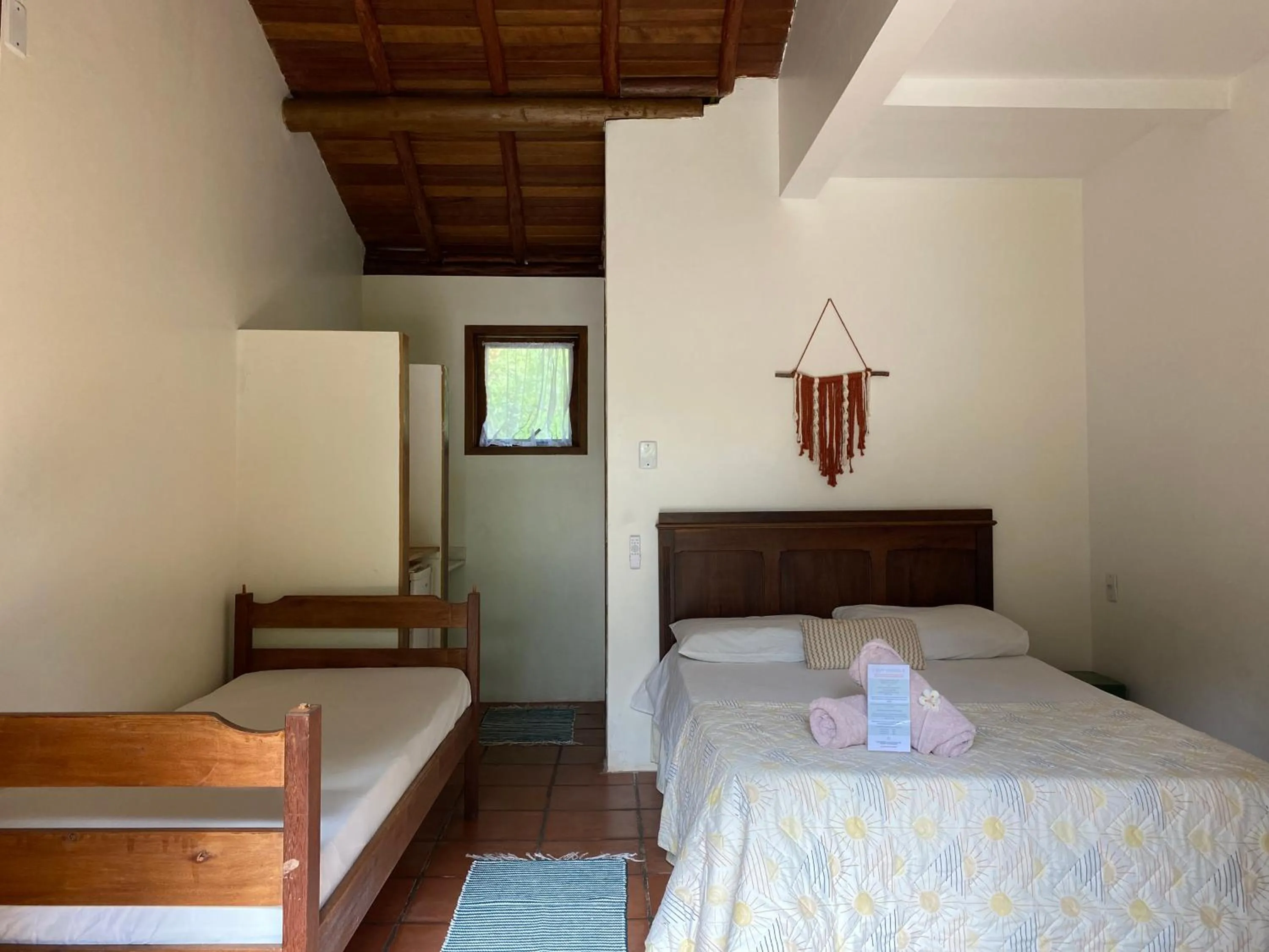 Photo of the whole room, Bed in Pousada Paradise Ferrugem