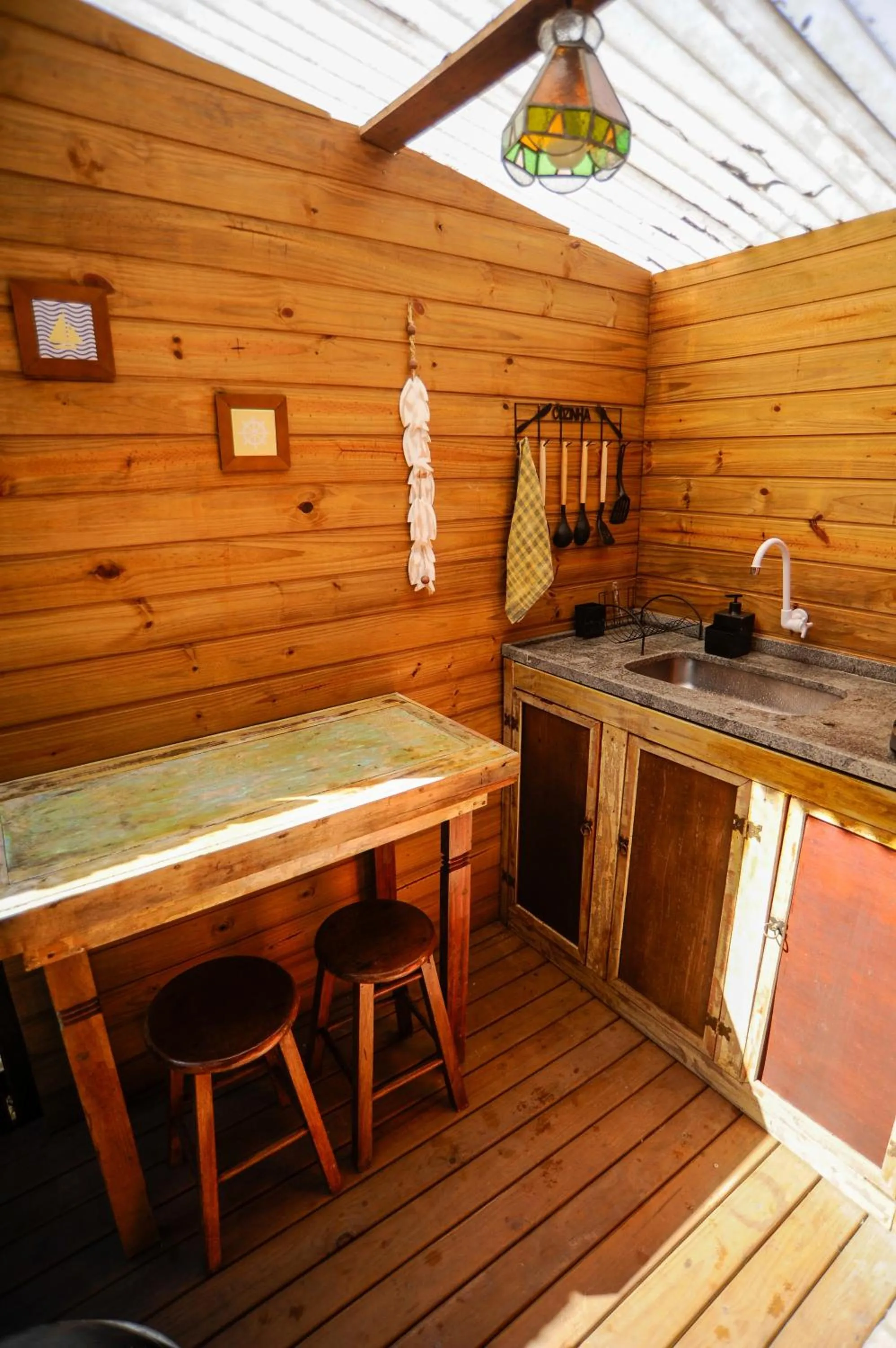 Kitchen or kitchenette in Pousada Paradise Ferrugem