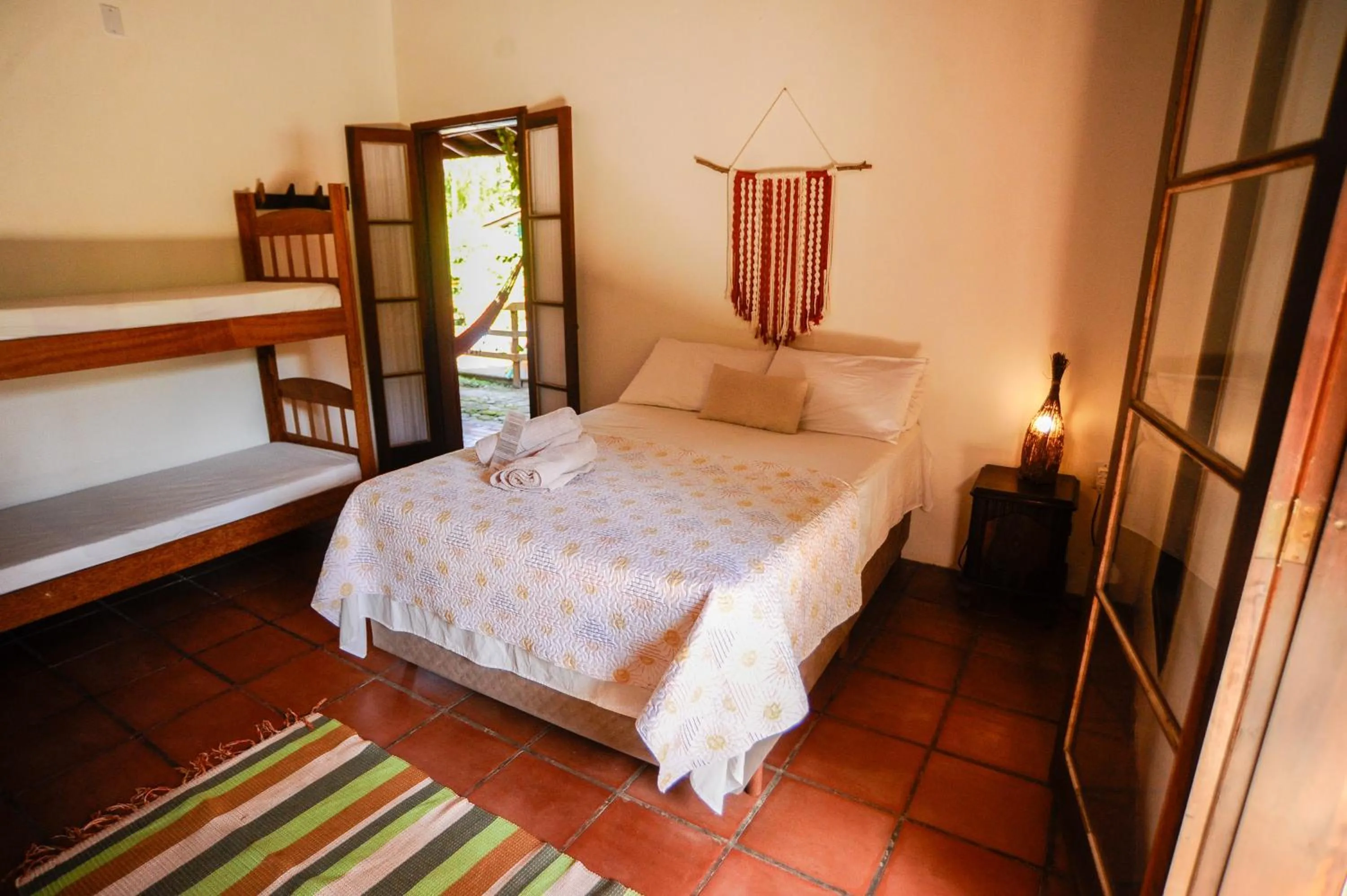 Bed in Pousada Paradise Ferrugem