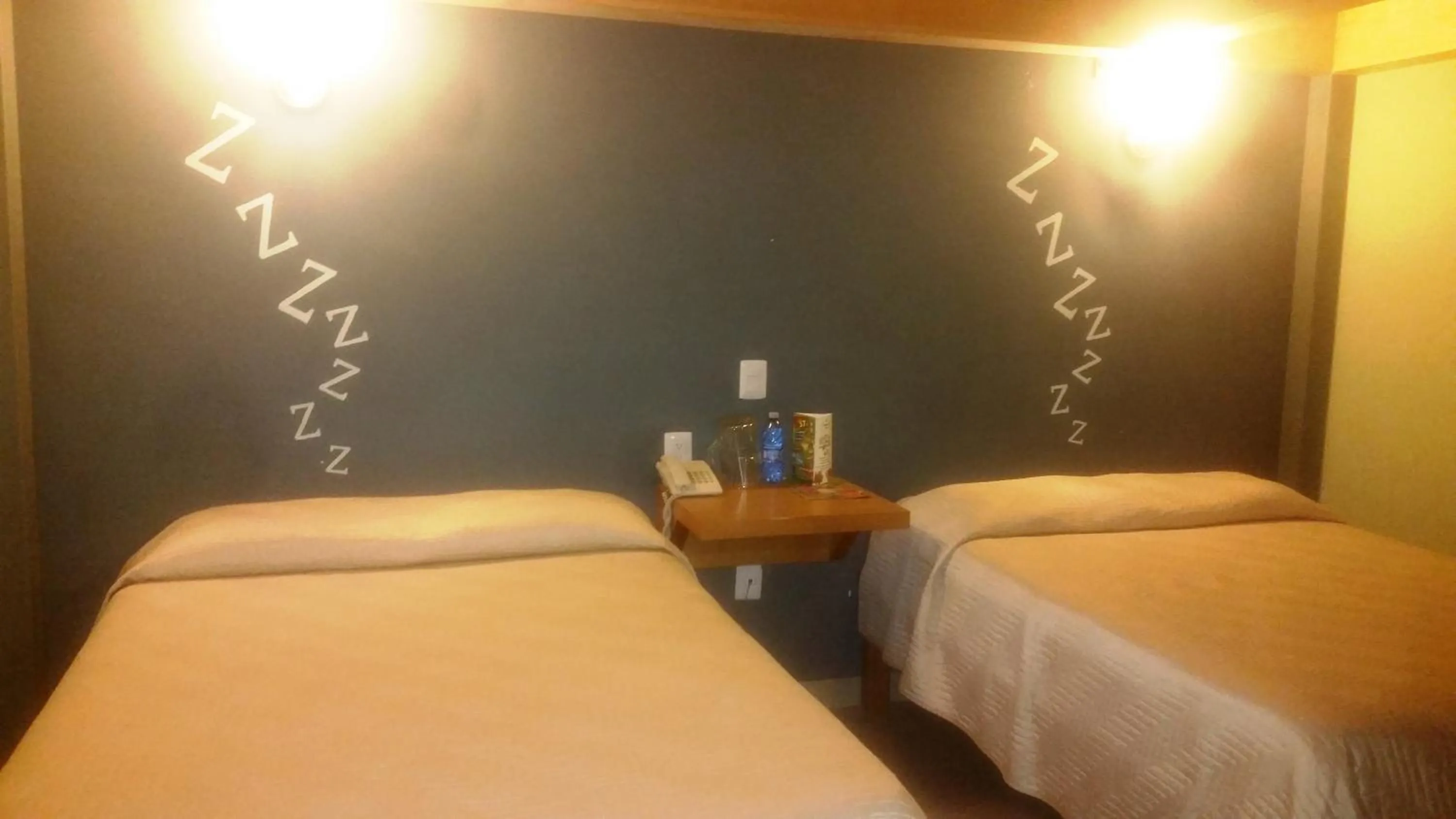 Bed in Hotel Plaza Queretaro