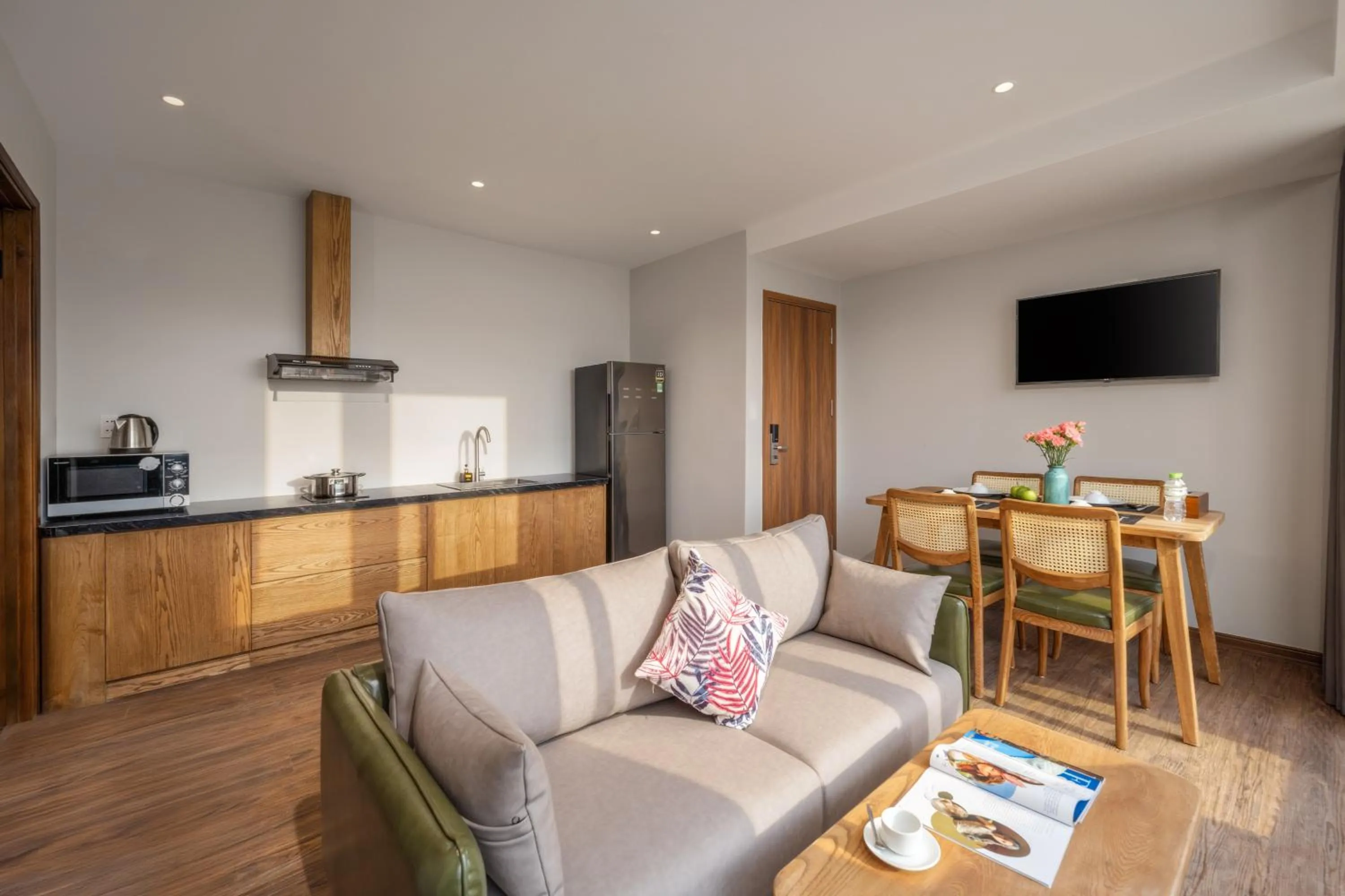 Communal lounge/ TV room in Taian Hotel & Apartment