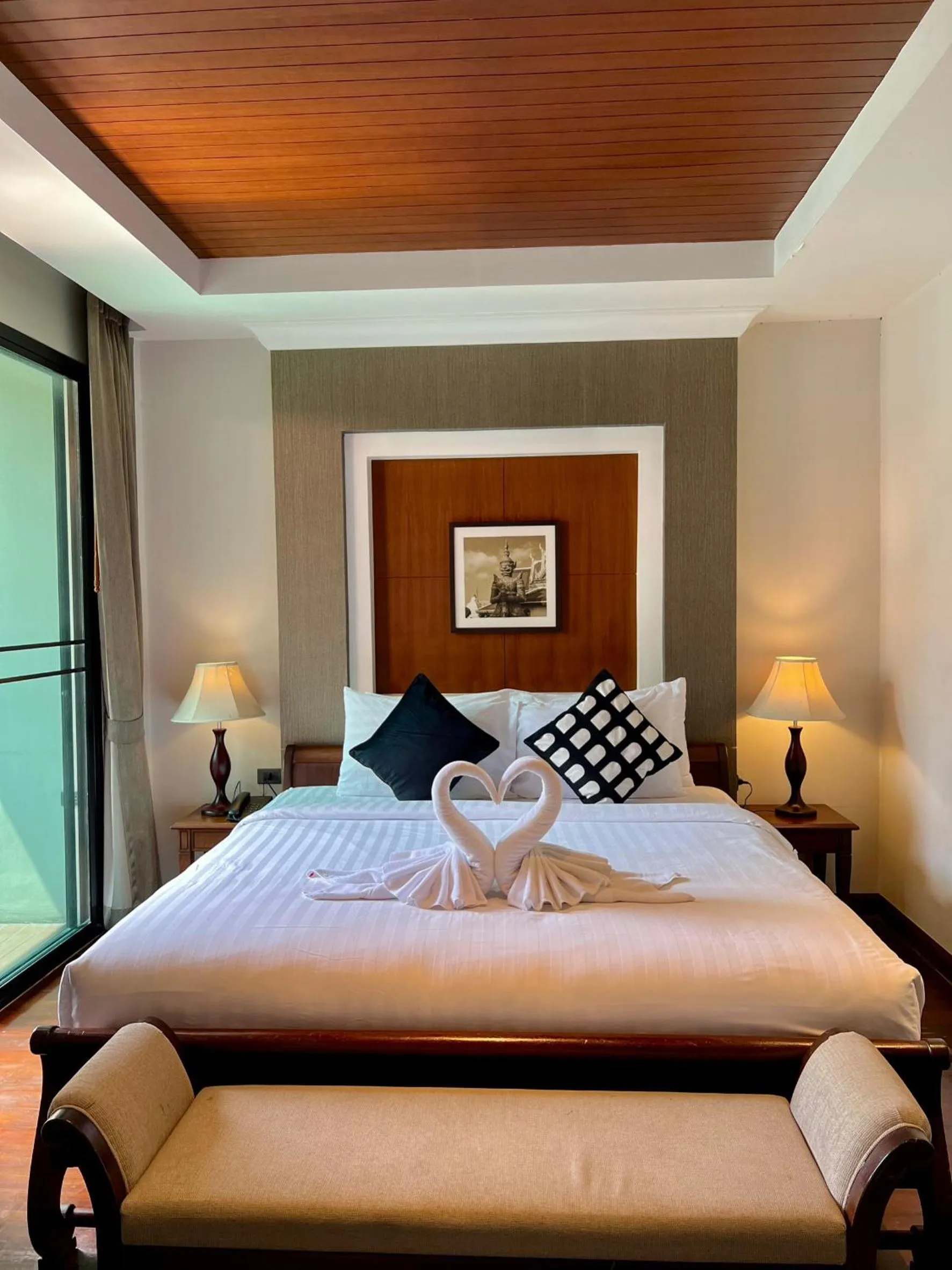 Bed in Yotaka Bangkok Hotel