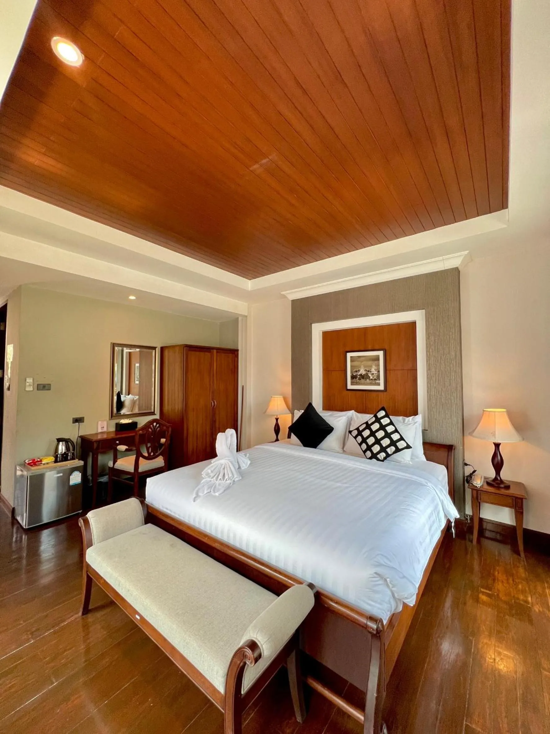 Bed in Yotaka Bangkok Hotel