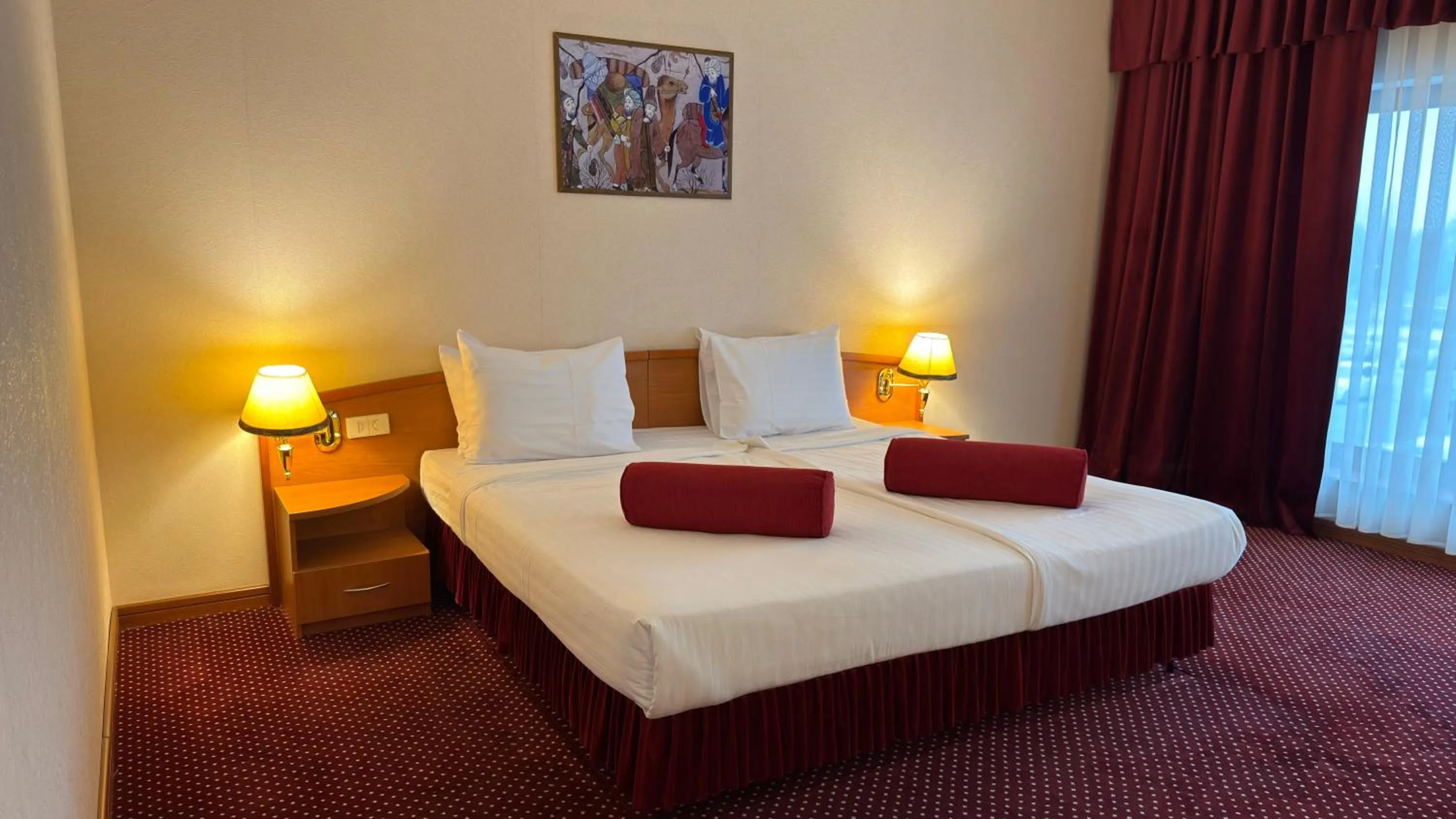 Bed in Khorezm Palace Hotel