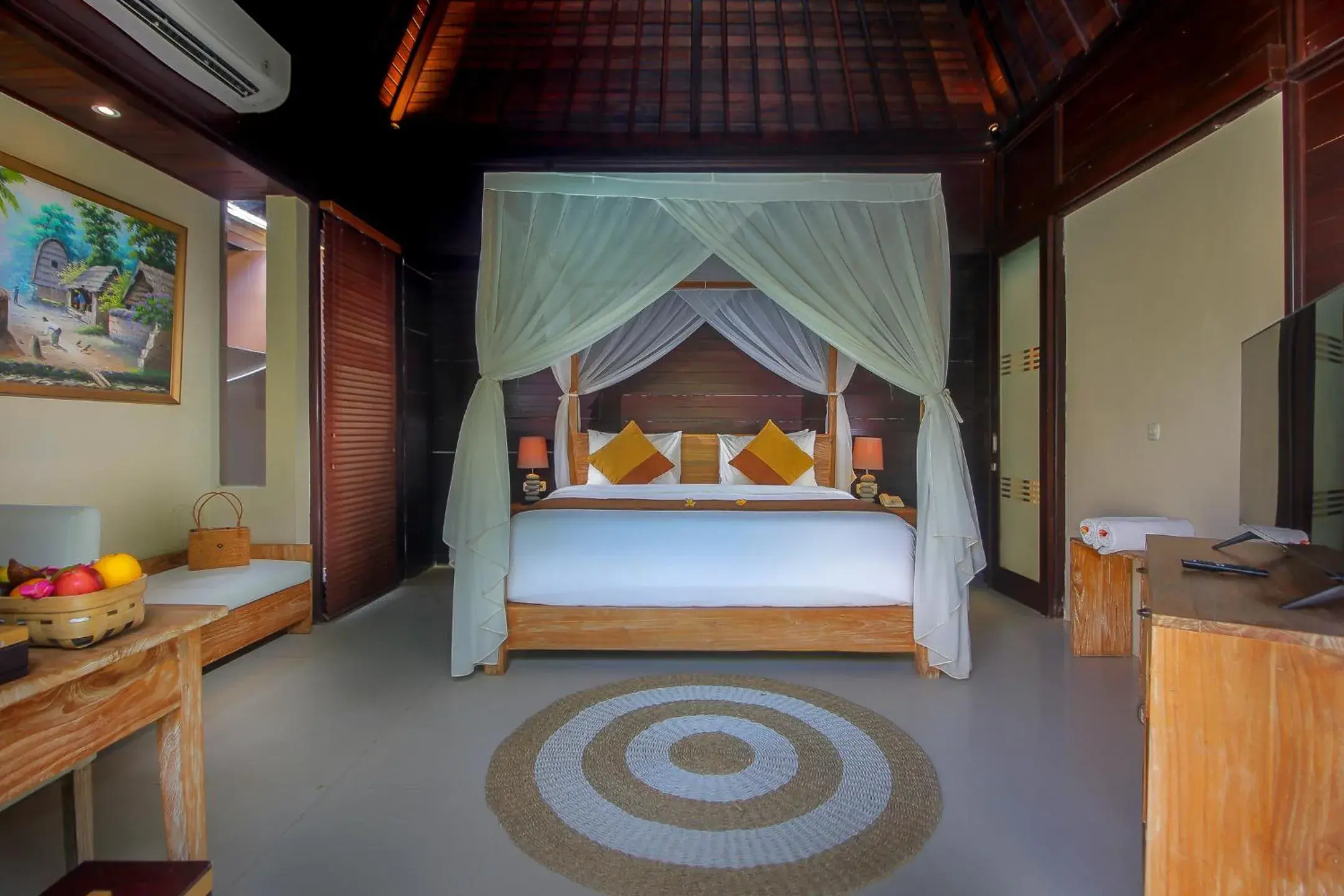 Bed in d'Nusa Beach Club and Resort Bed in d'Nusa Beach Club and Resort