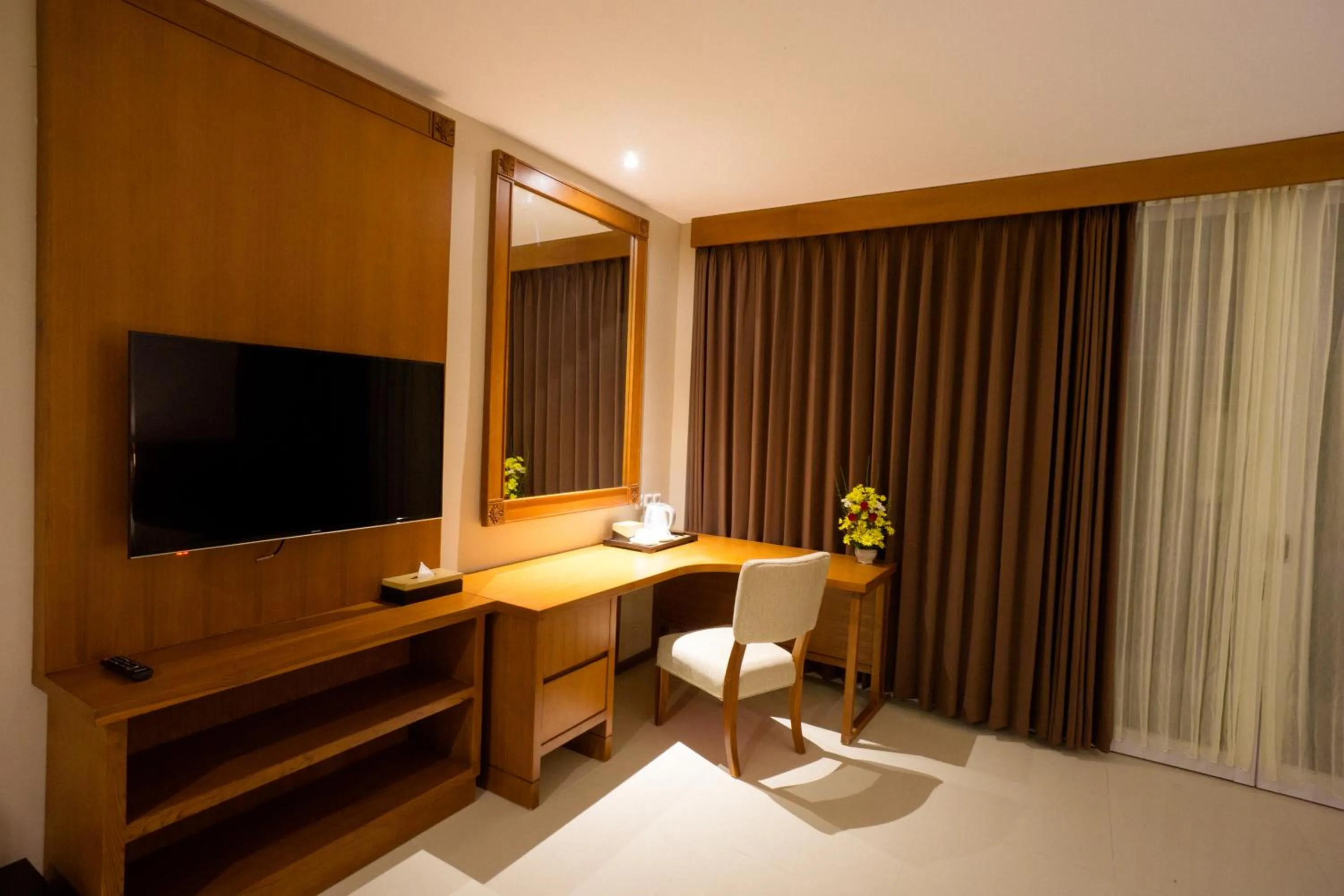 Seating area in d'Nusa Beach Club and Resort