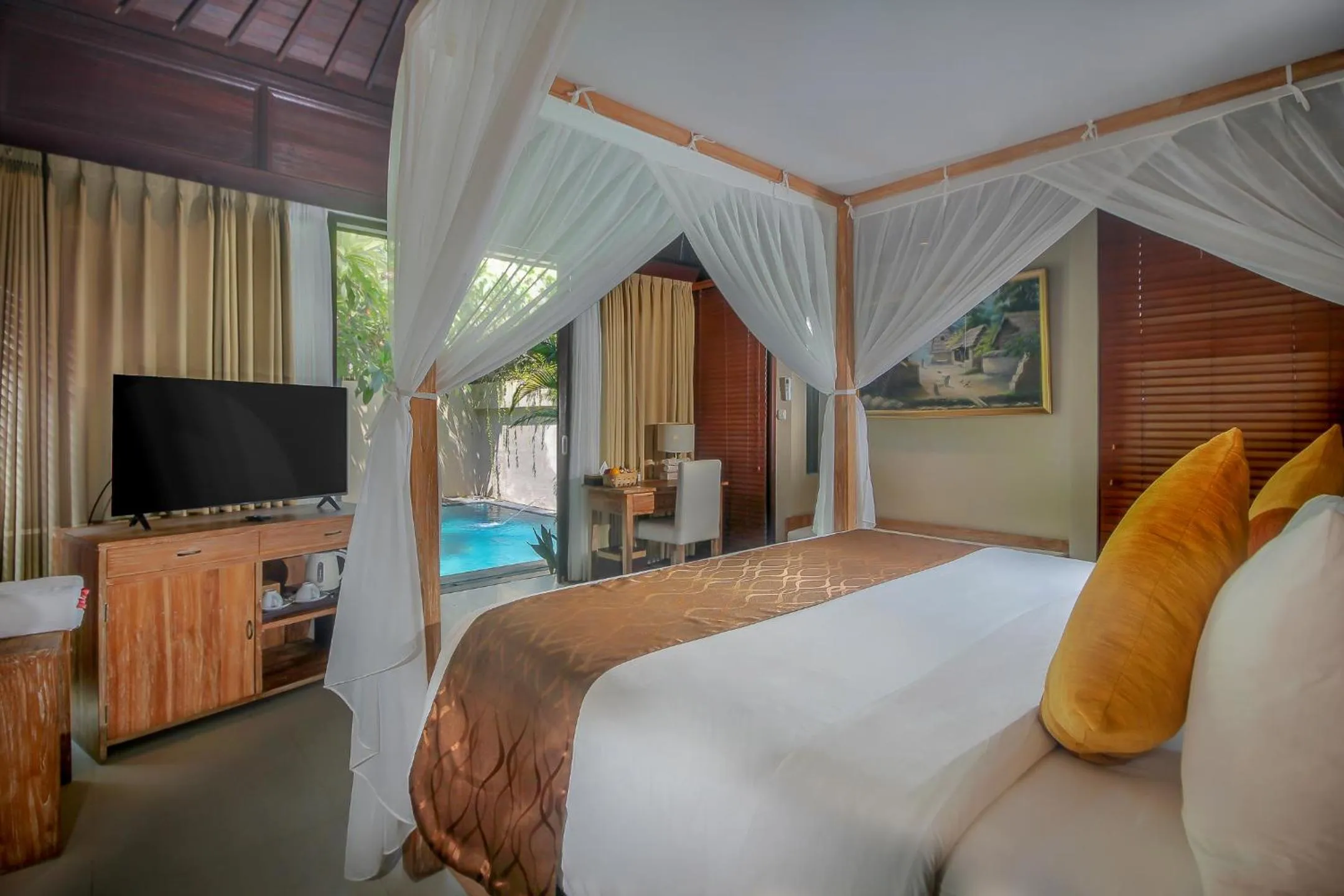 Bed in d'Nusa Beach Club and Resort