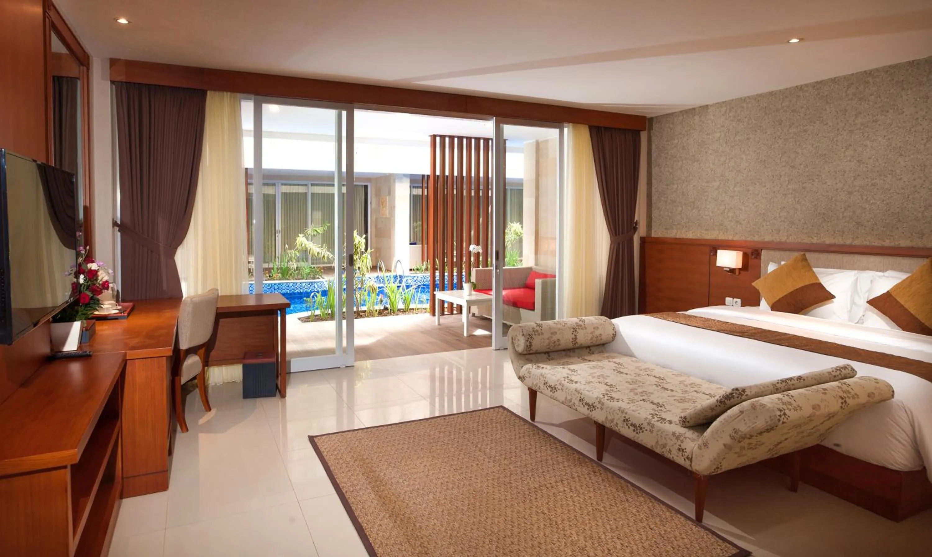 Bed in d'Nusa Beach Club and Resort