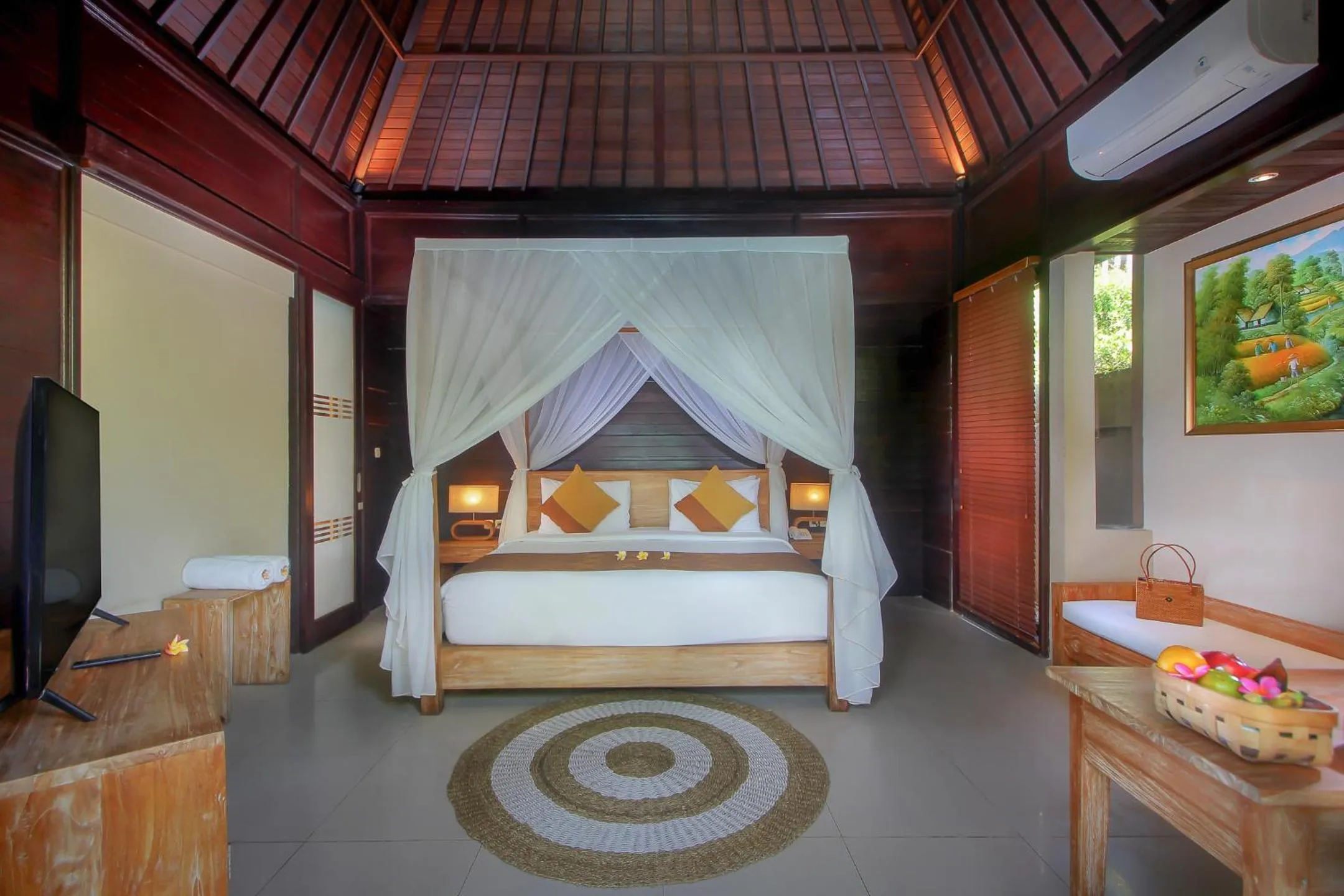 Bed in d'Nusa Beach Club and Resort