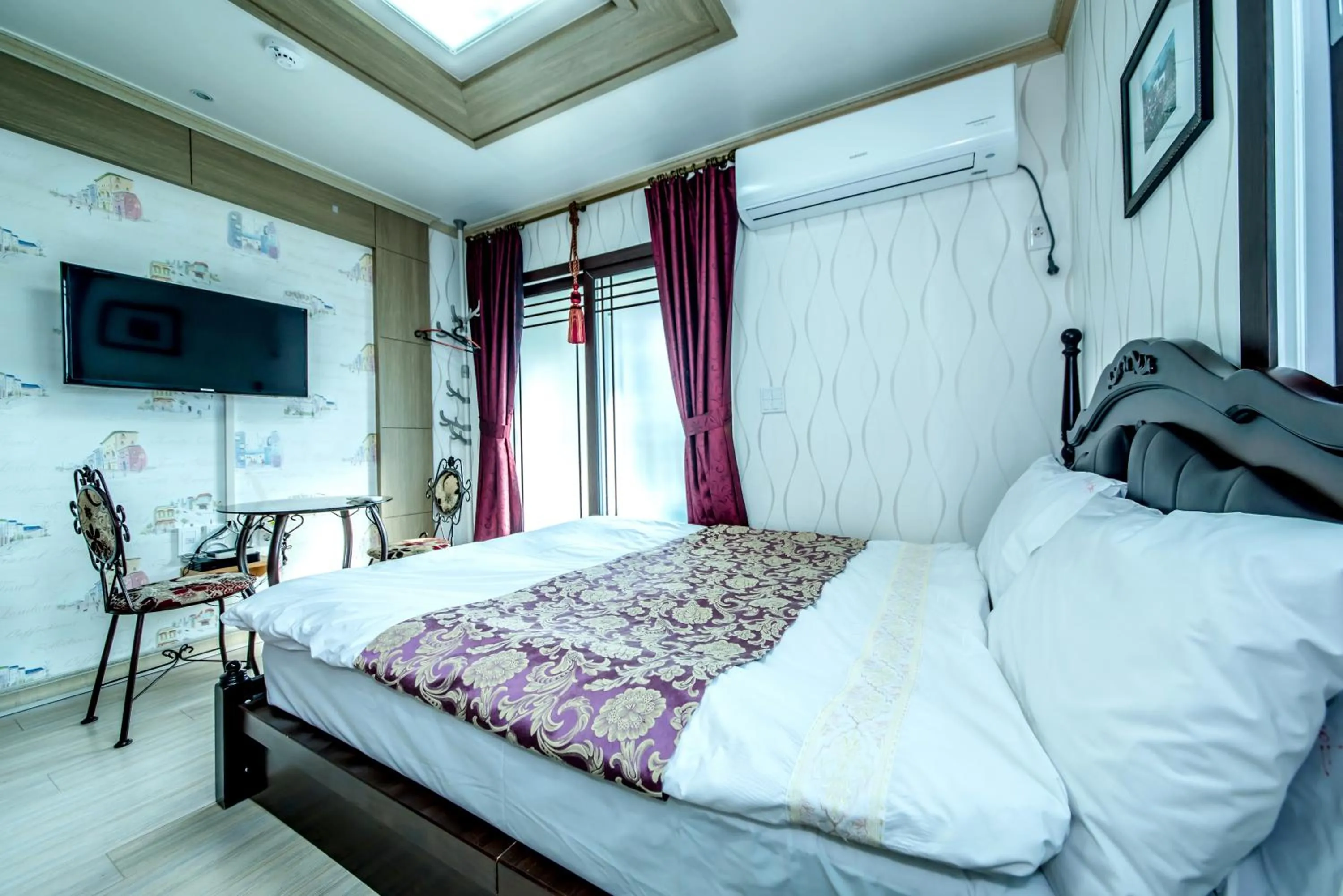 Bed in Jeju Hue Pension