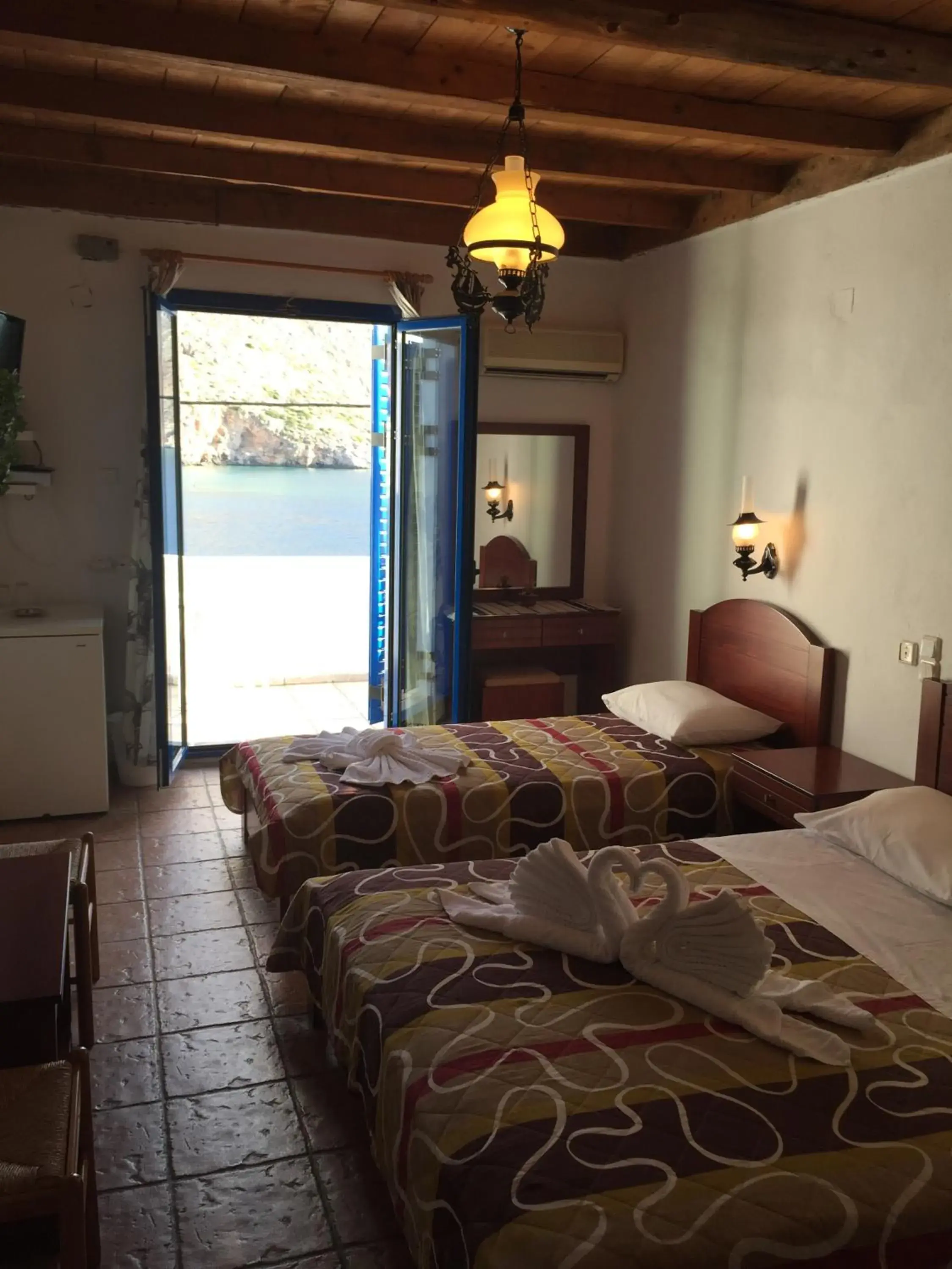 Balcony/Terrace, Bed in Daskalogiannis Hotel Balcony/Terrace, Bed in Daskalogiannis Hotel