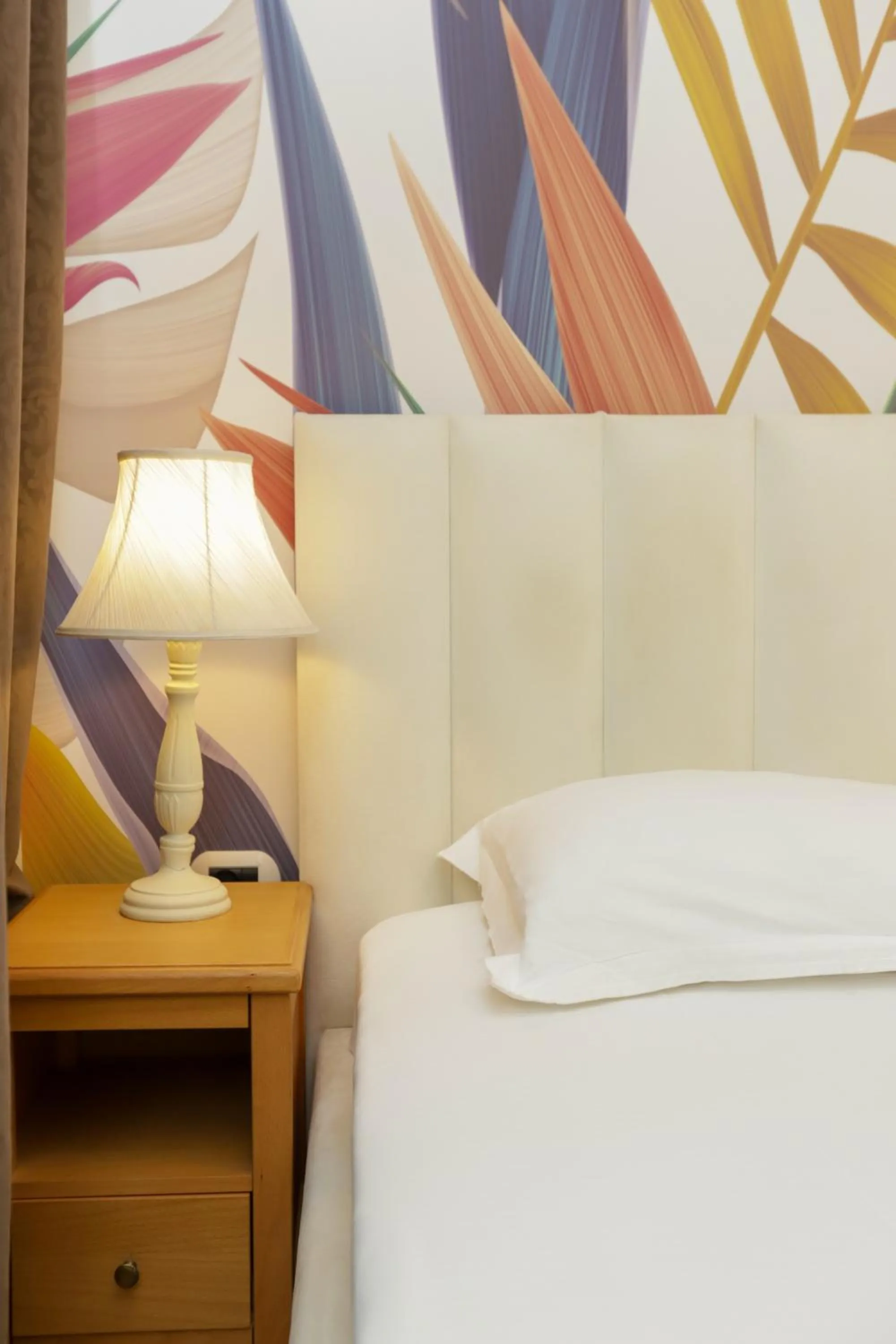 Bed in Le Palazzine Hotel