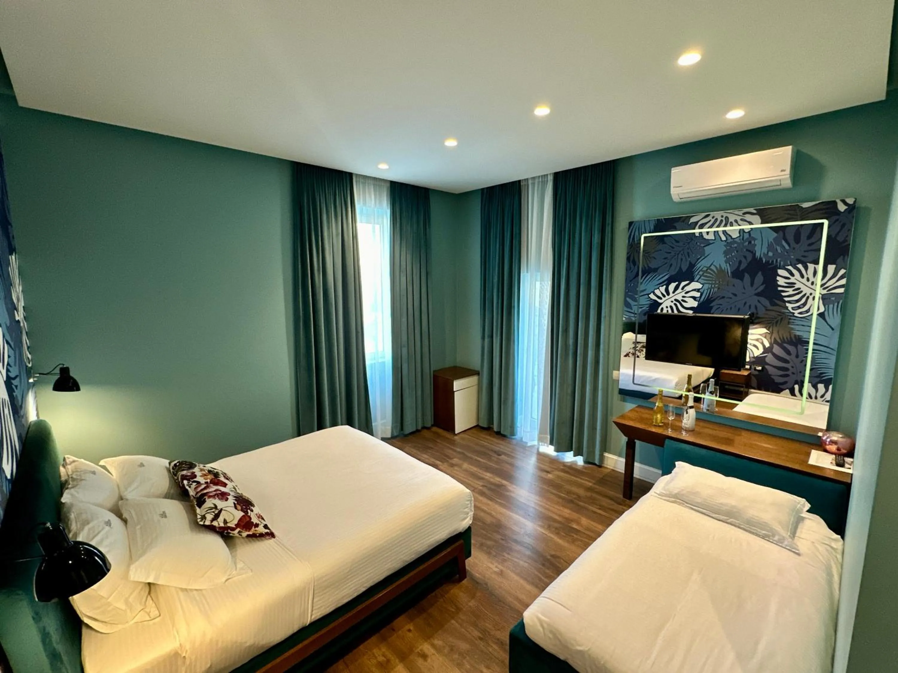 Bed in Le Palazzine Hotel