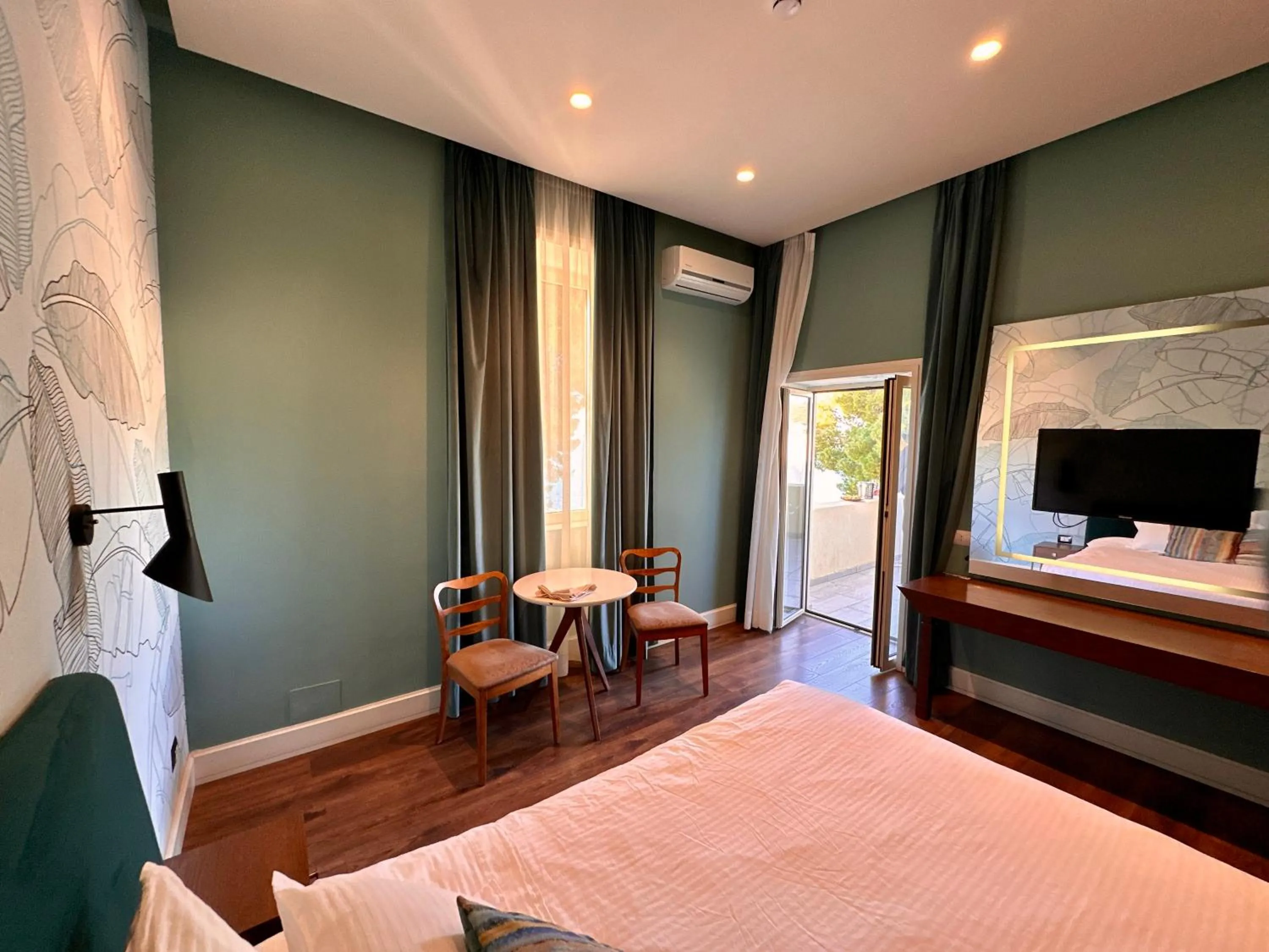 Bed in Le Palazzine Hotel